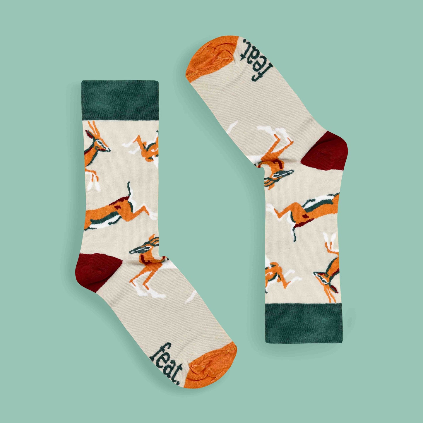 Khaki springbok socks green background inverted