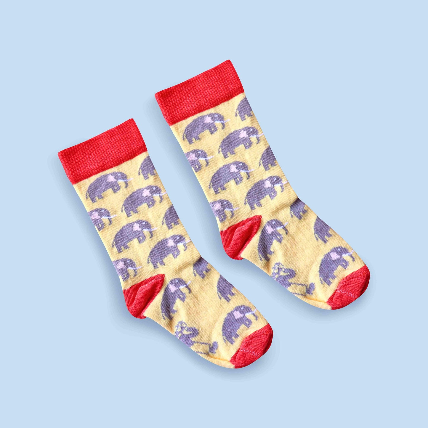 Kids elephant socks blue background diagonal