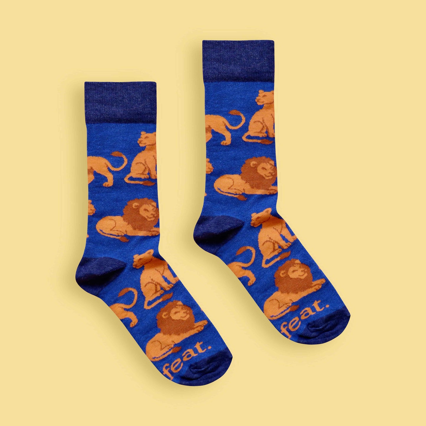 Adults Lion socks yellow background centered
