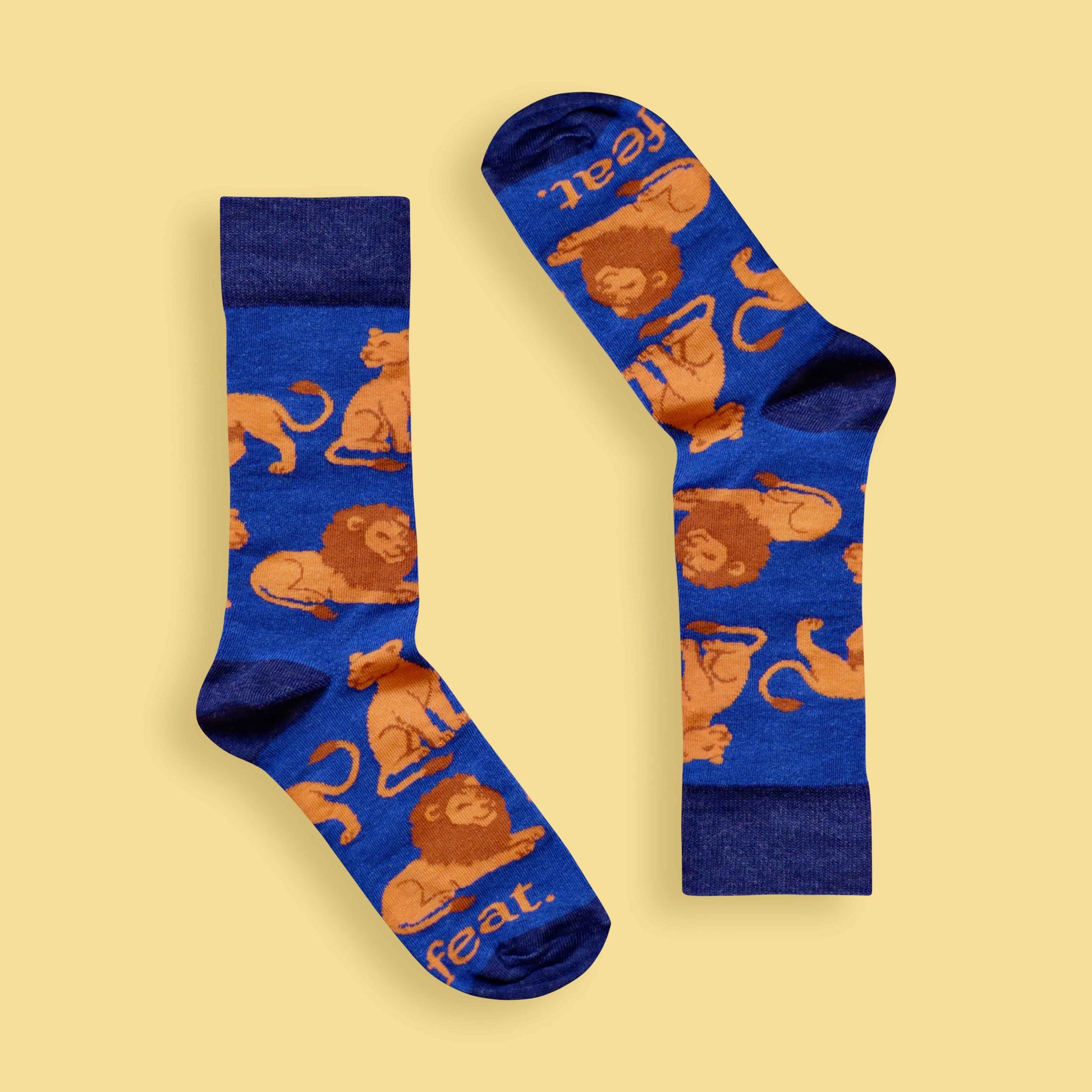 Adults Lion socks yellow background inverted