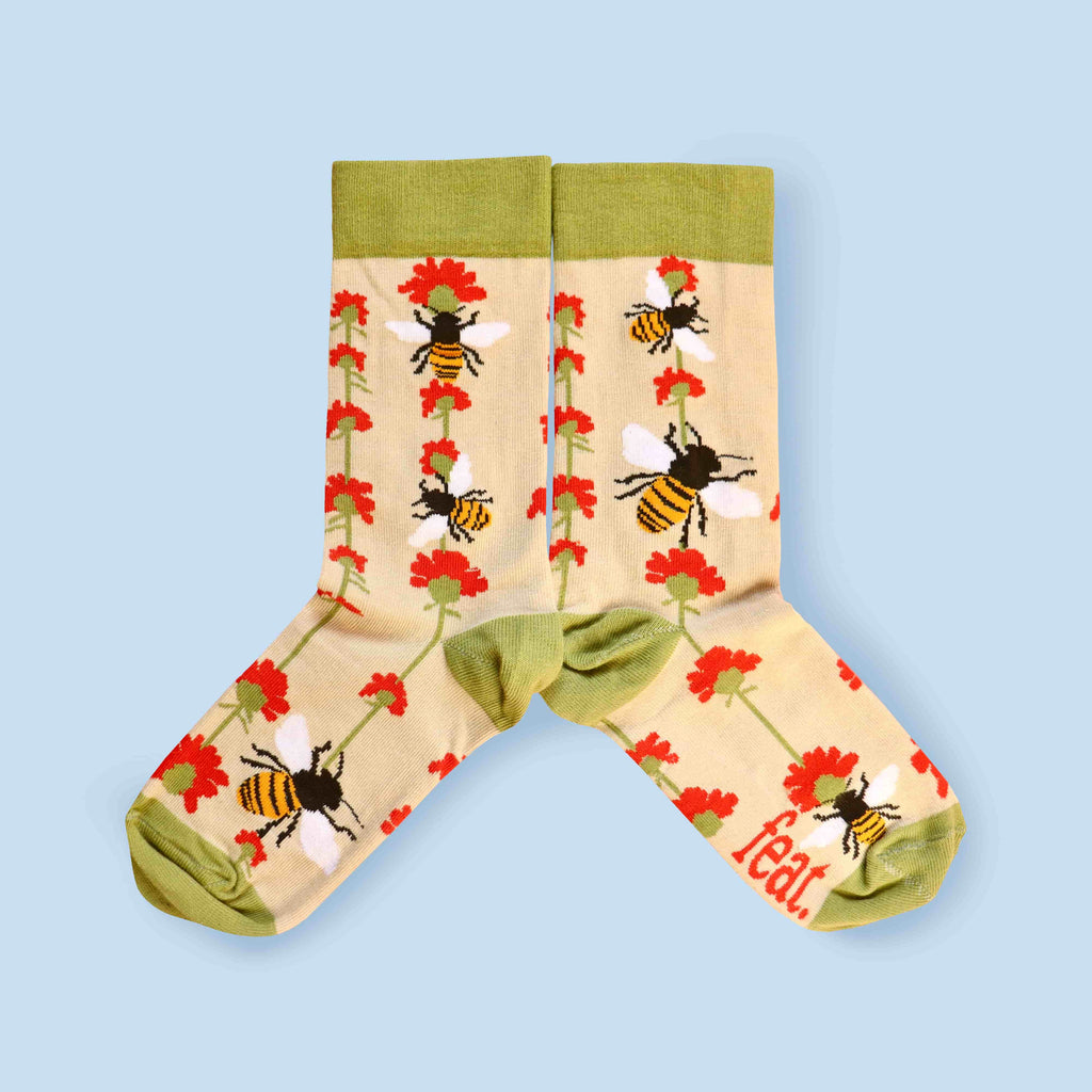 Bee and flower socks mirror image blue background