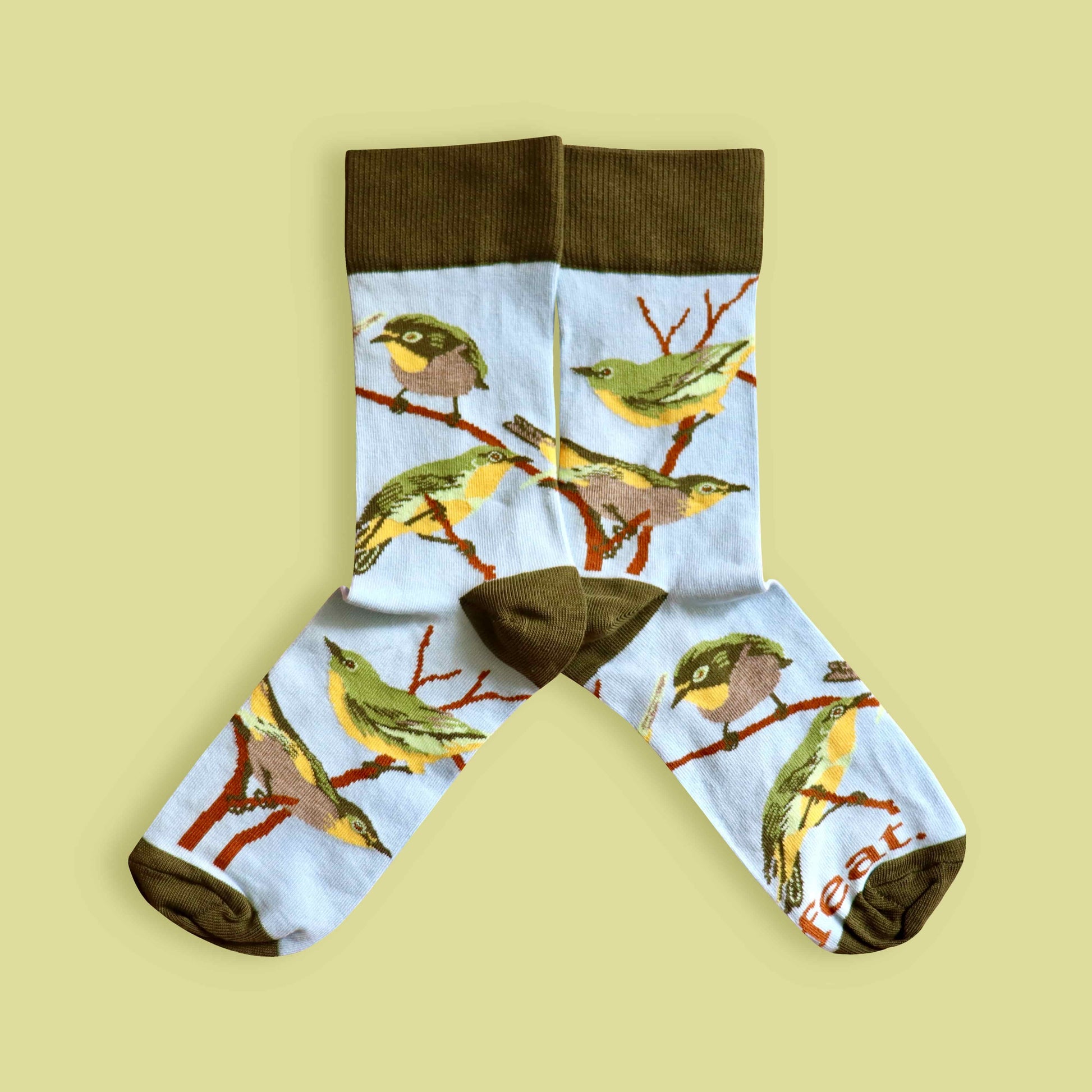 Cape white-eye socks lime background mirrored