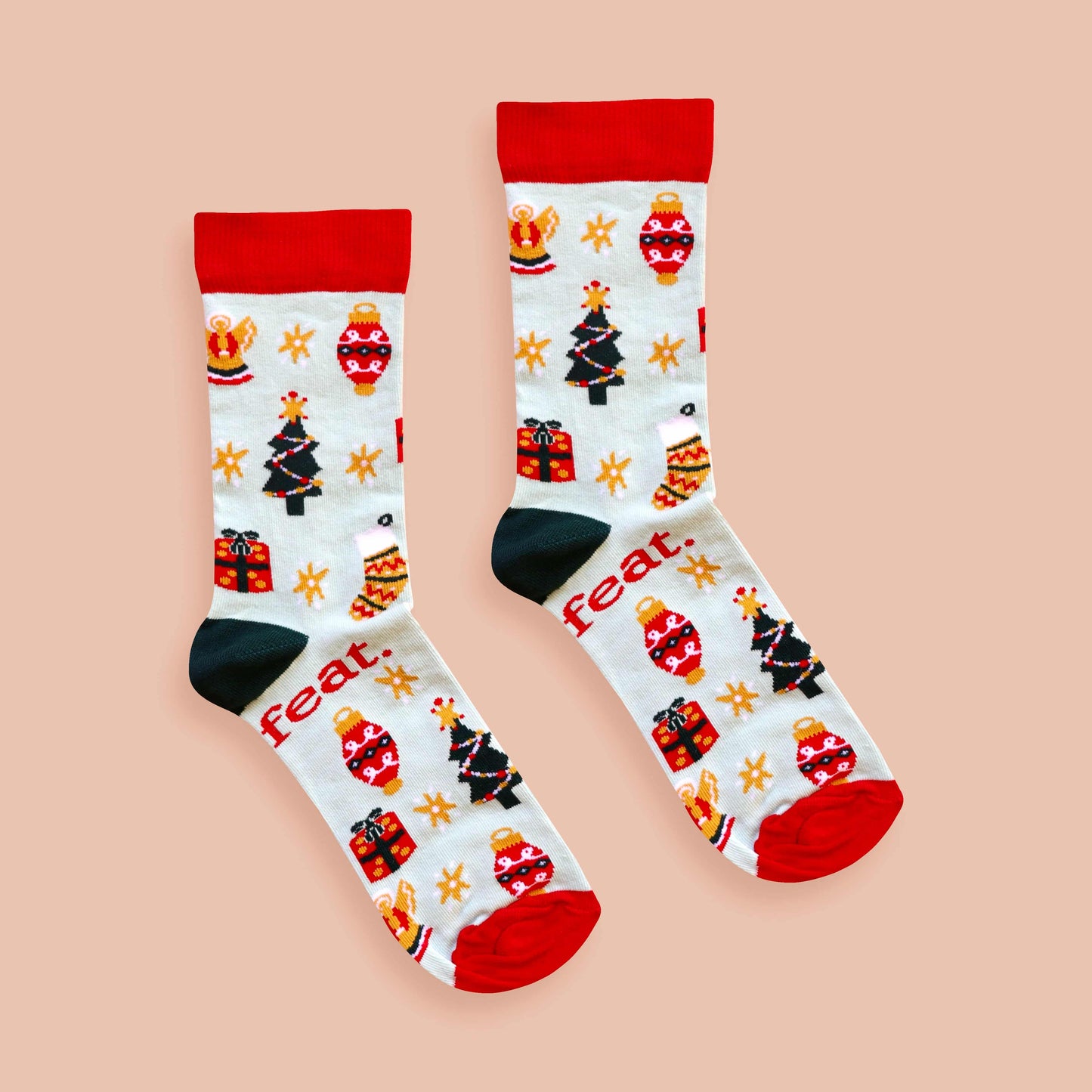 Christmas Cheer socks coral background centered