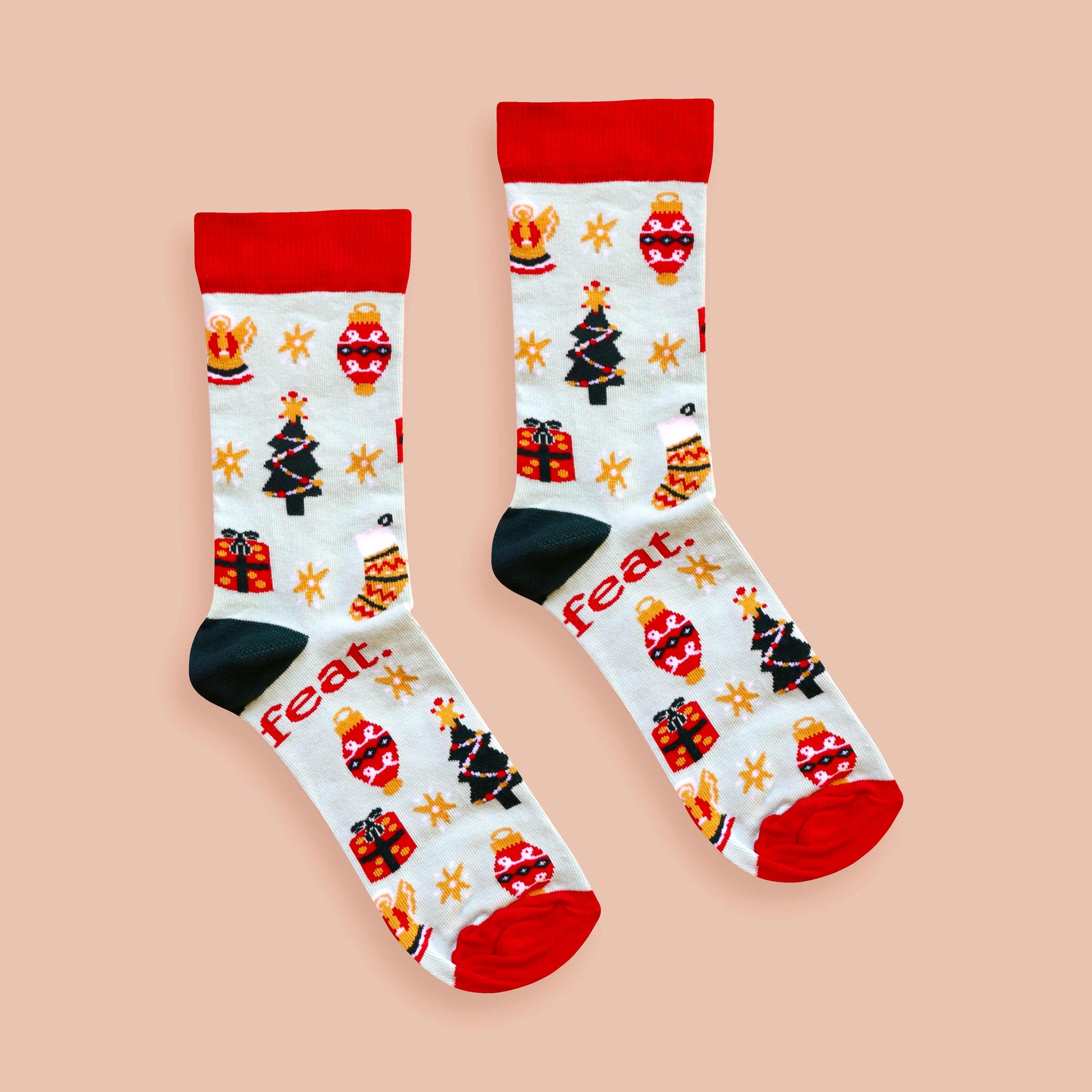 Christmas Cheer socks coral background centered