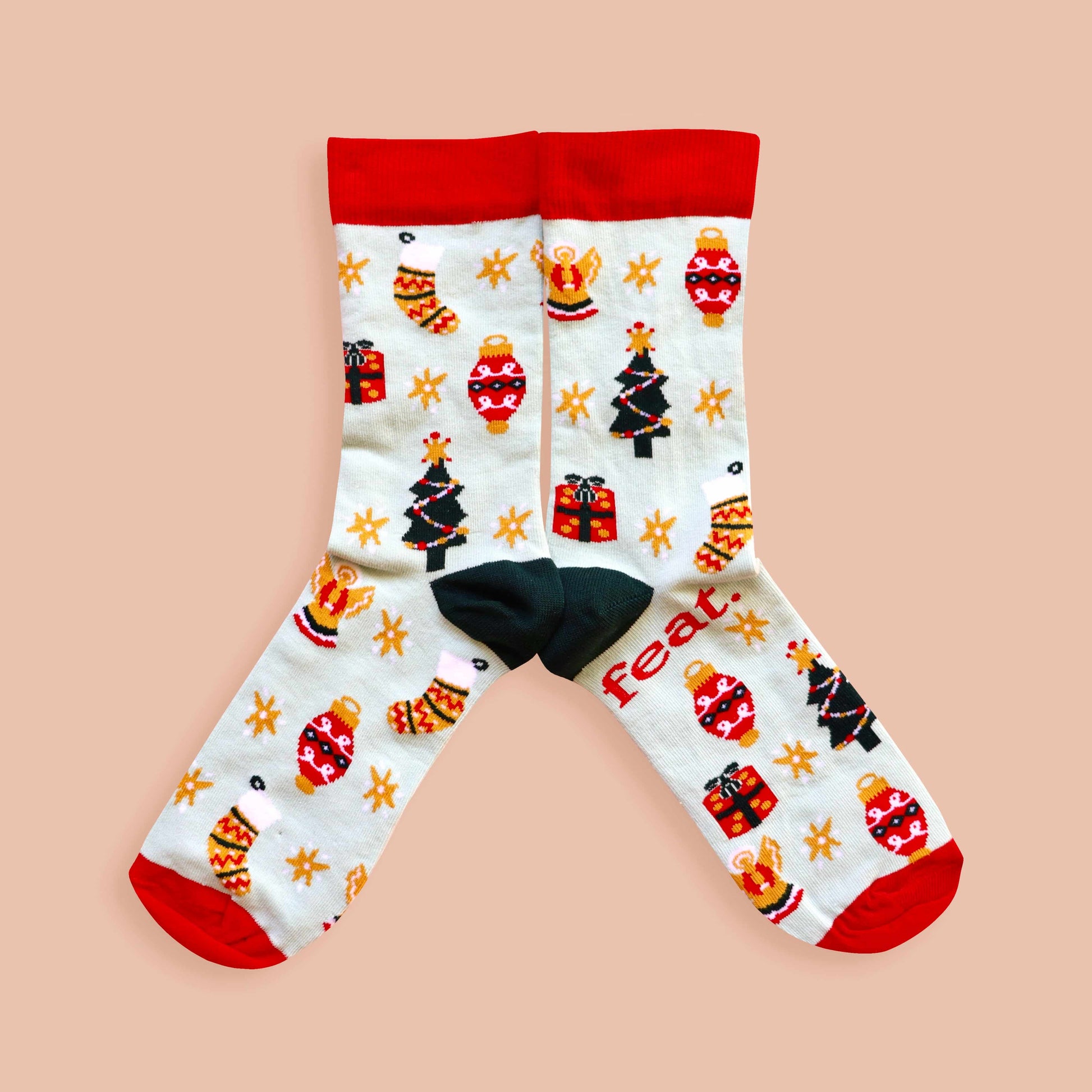 Christmas Cheer socks coral background mirrored