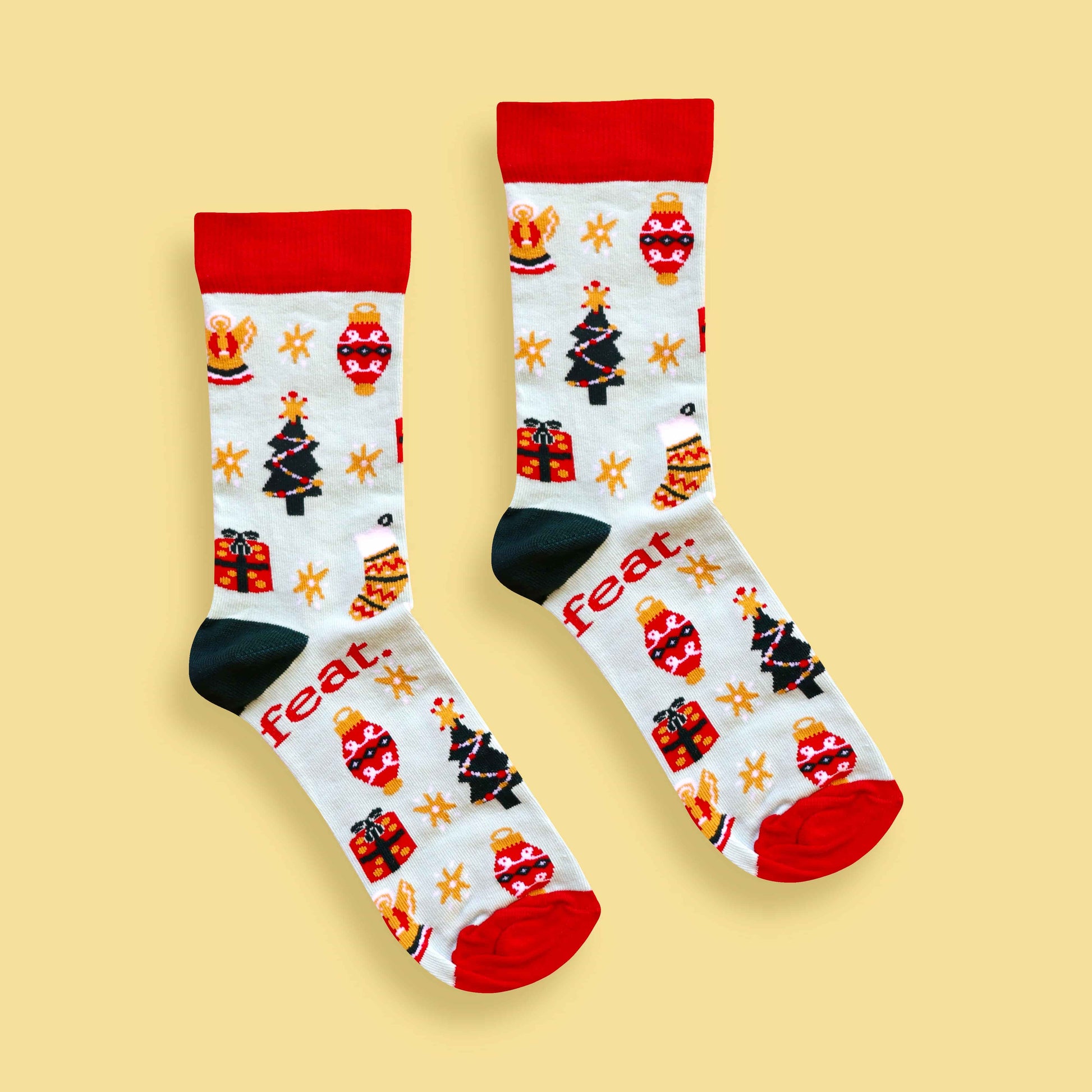 Christmas Cheer socks yellow background centered