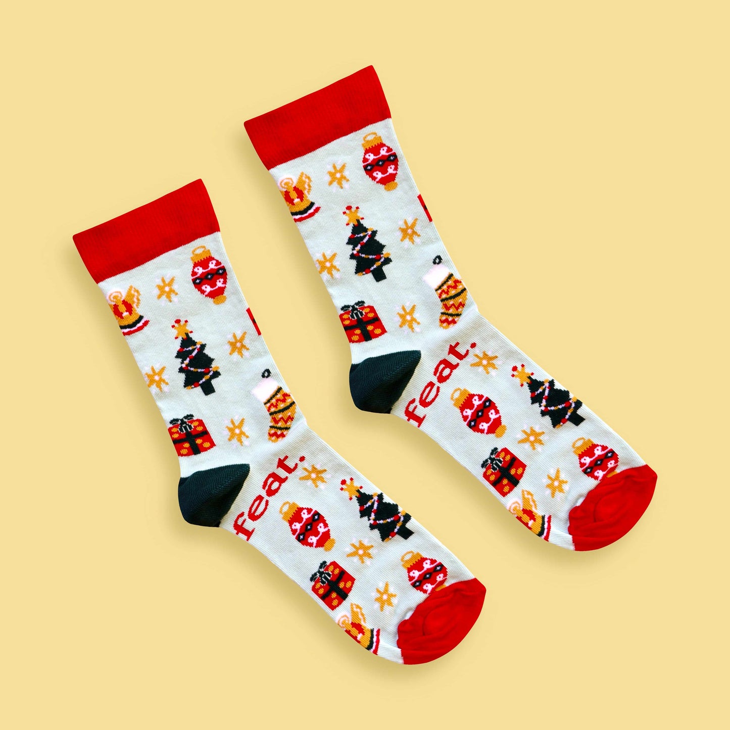 Christmas Cheer socks yellow background diagonal