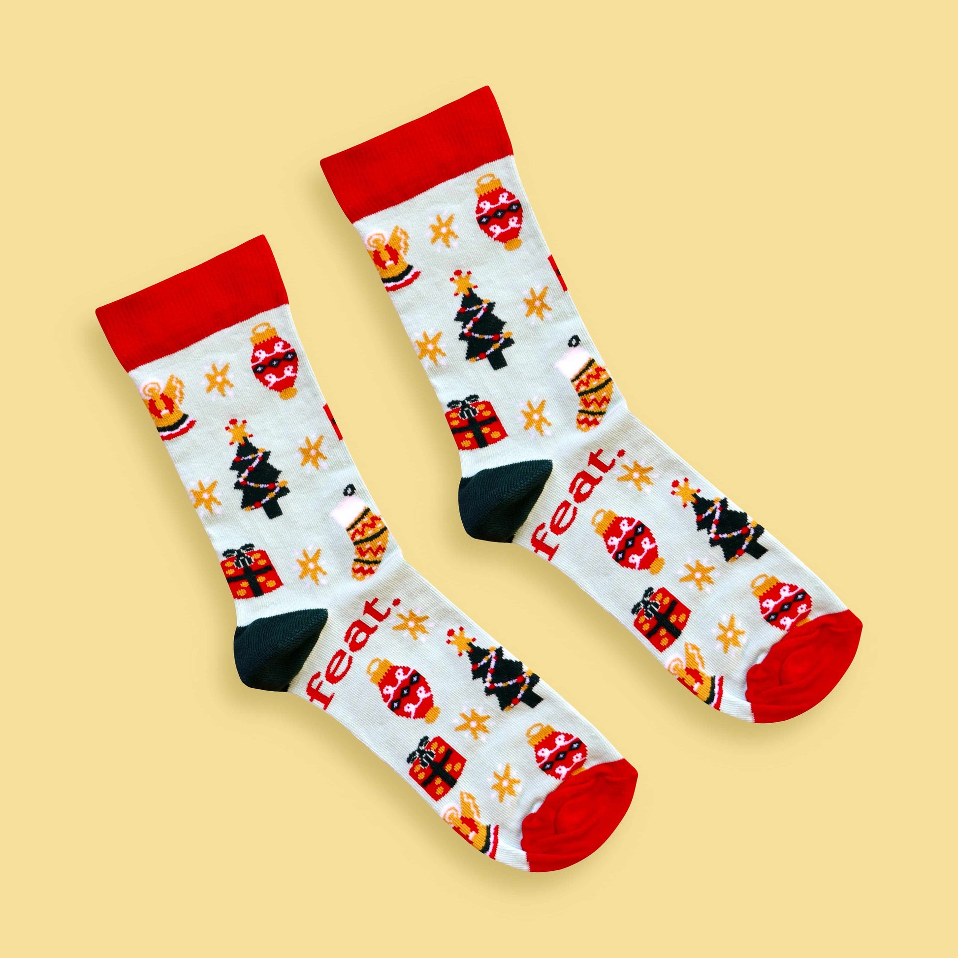 Christmas Cheer socks yellow background diagonal