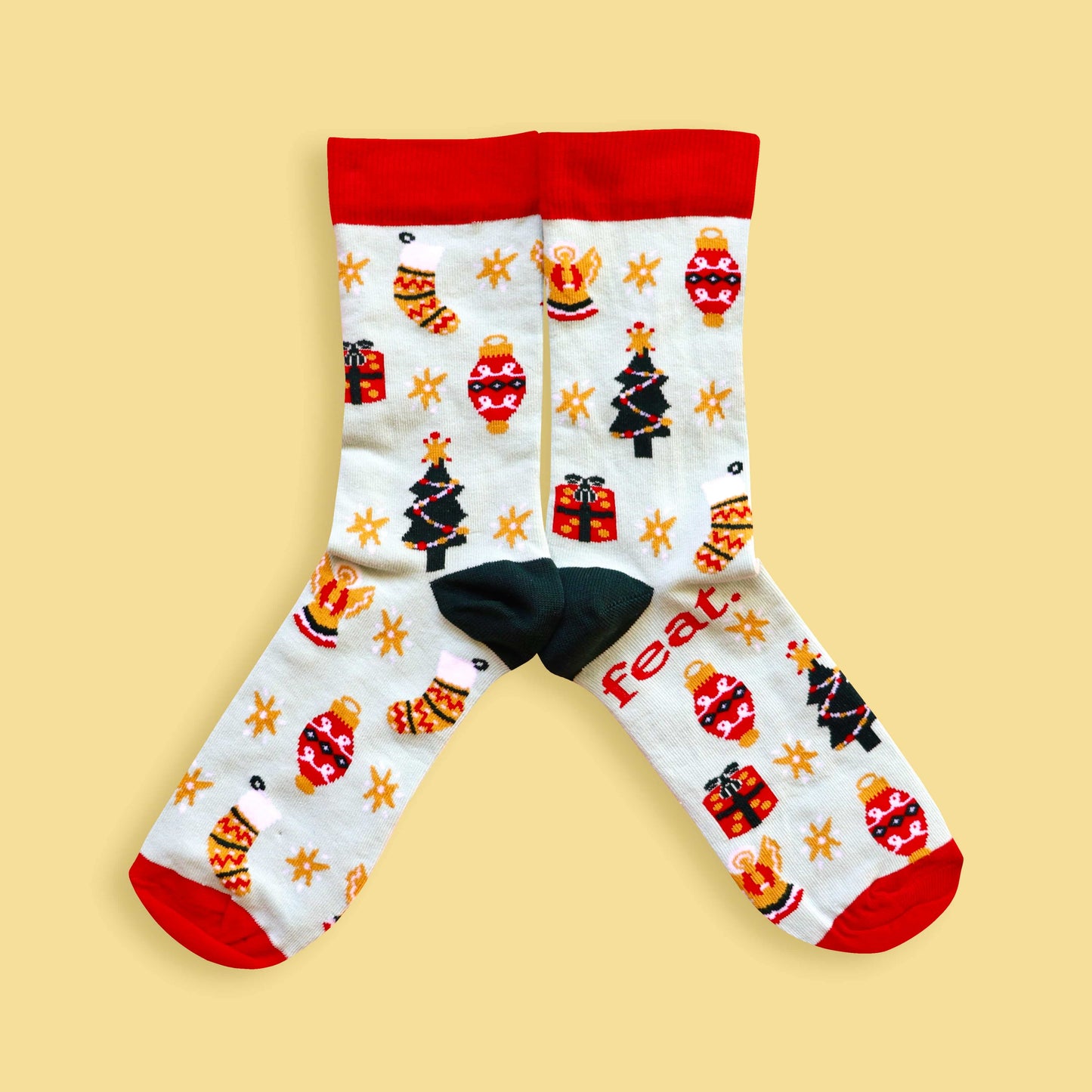 Christmas Cheer socks yellow background mirrored