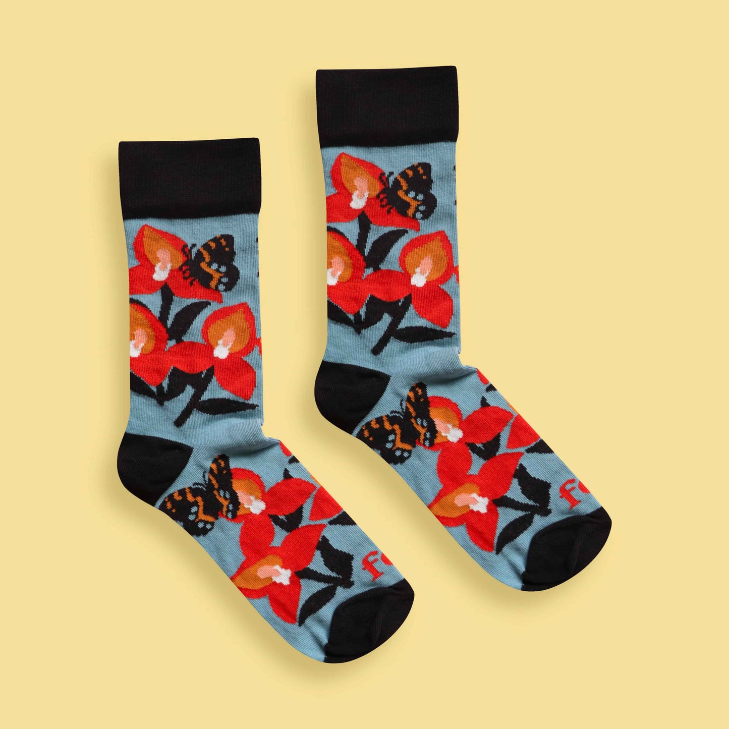 Disa and butterfly socks yellow background centered