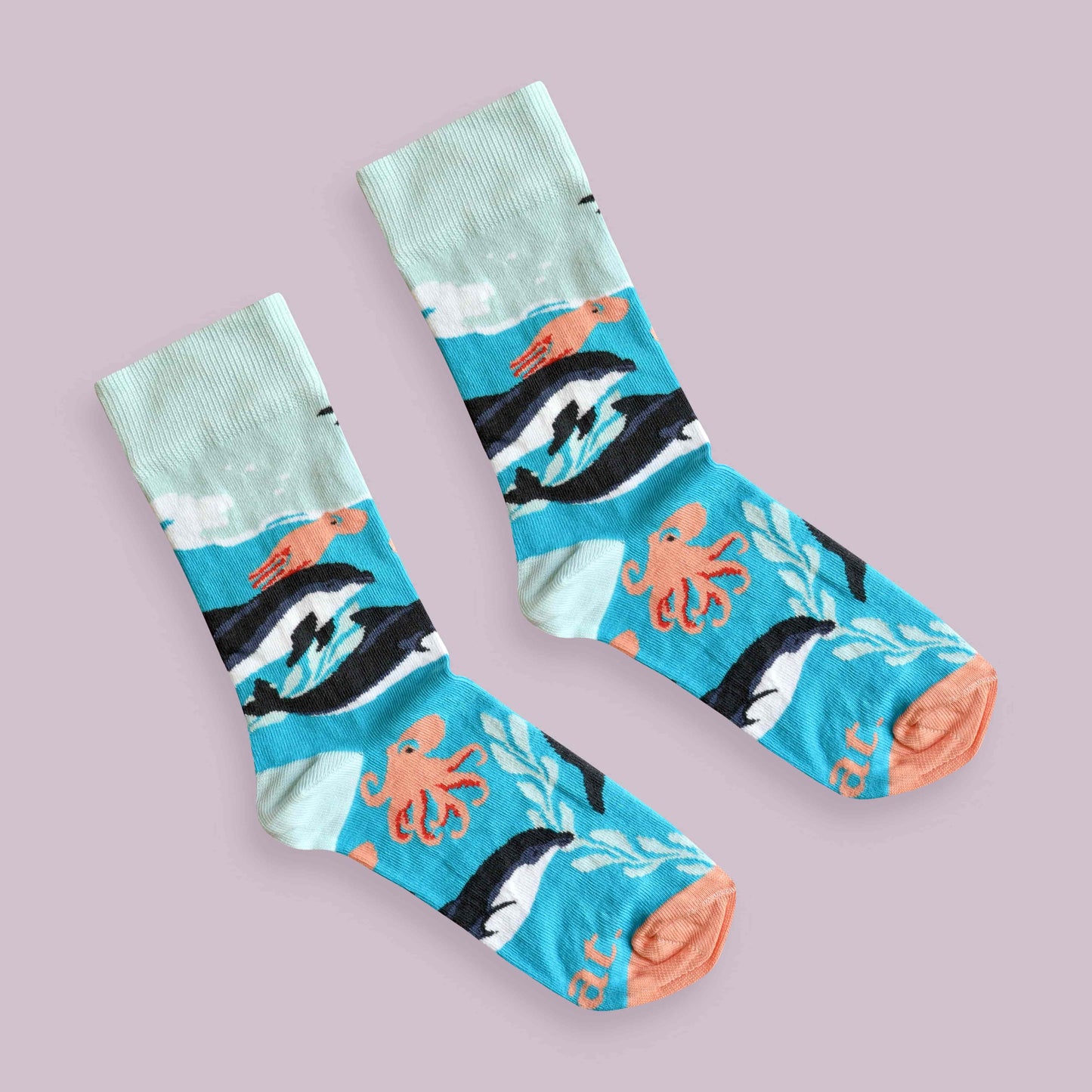 Dolphin socks lilac background diagonal