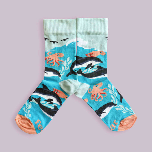 Dolphin socks lilac background mirrored
