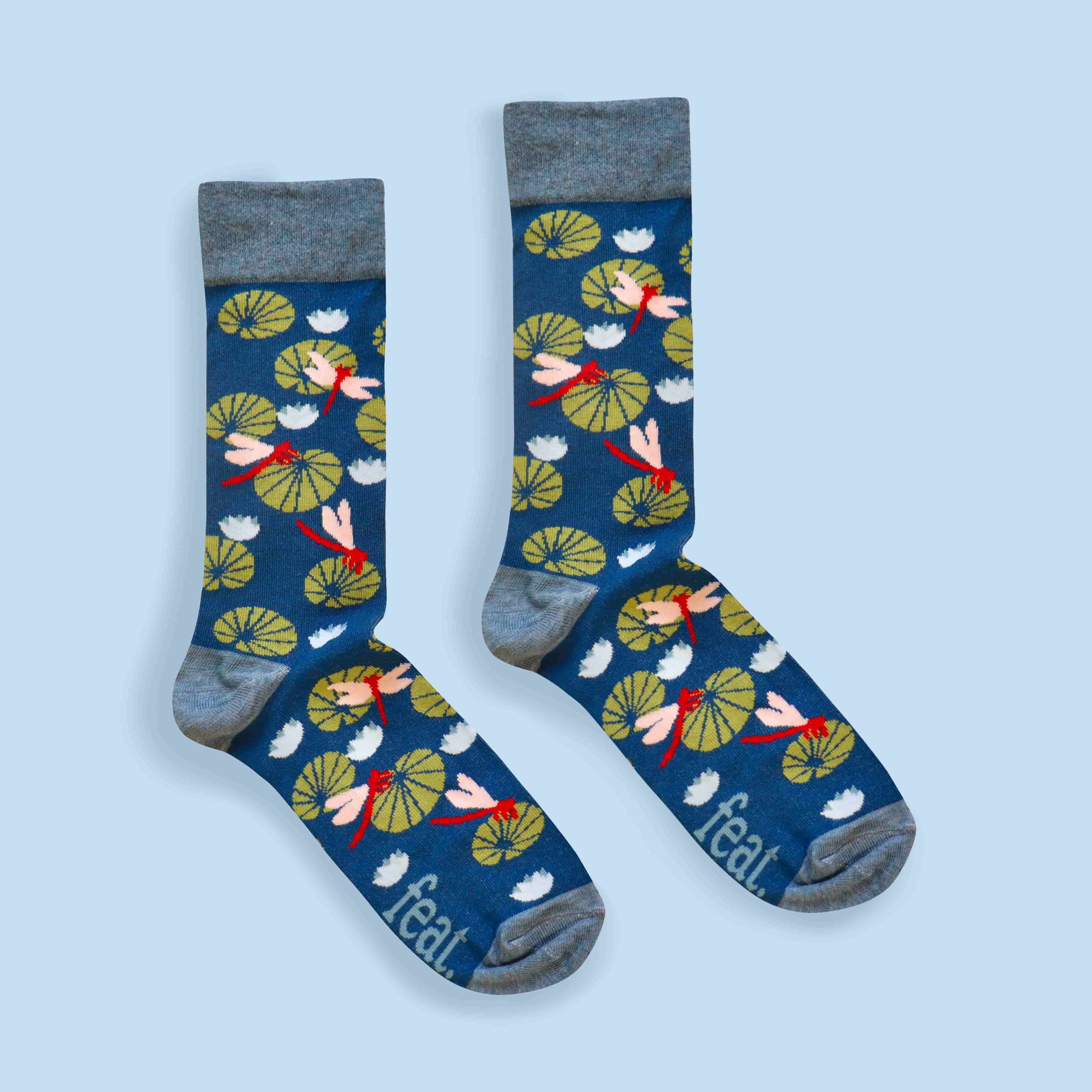 Dragonfly socks centre image blue background