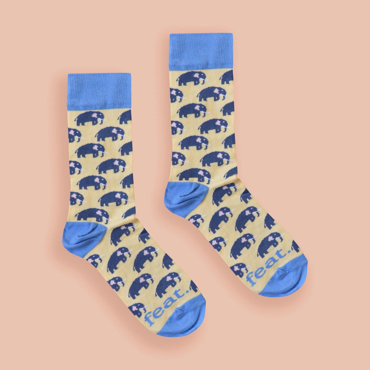 Elephant socks peach background centered