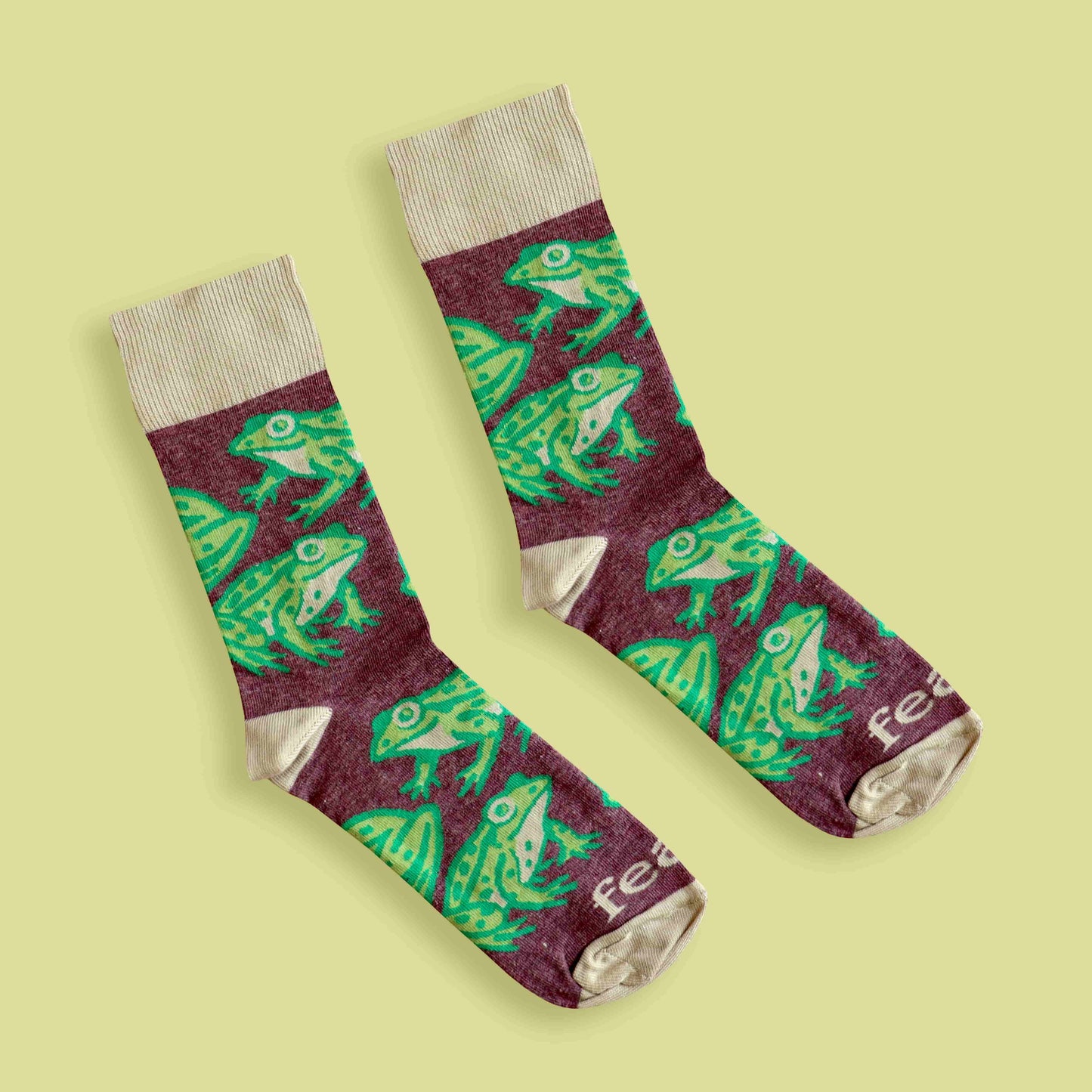Cape river frog socks lime background diagonal