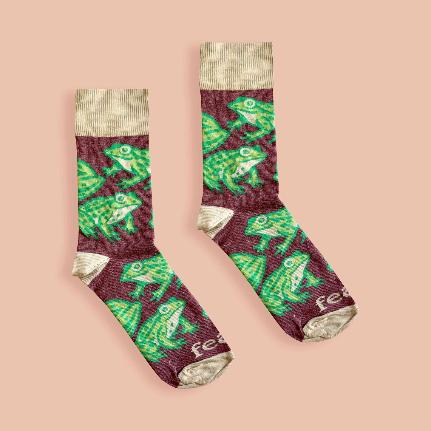 Cape river frog socks peach background centered