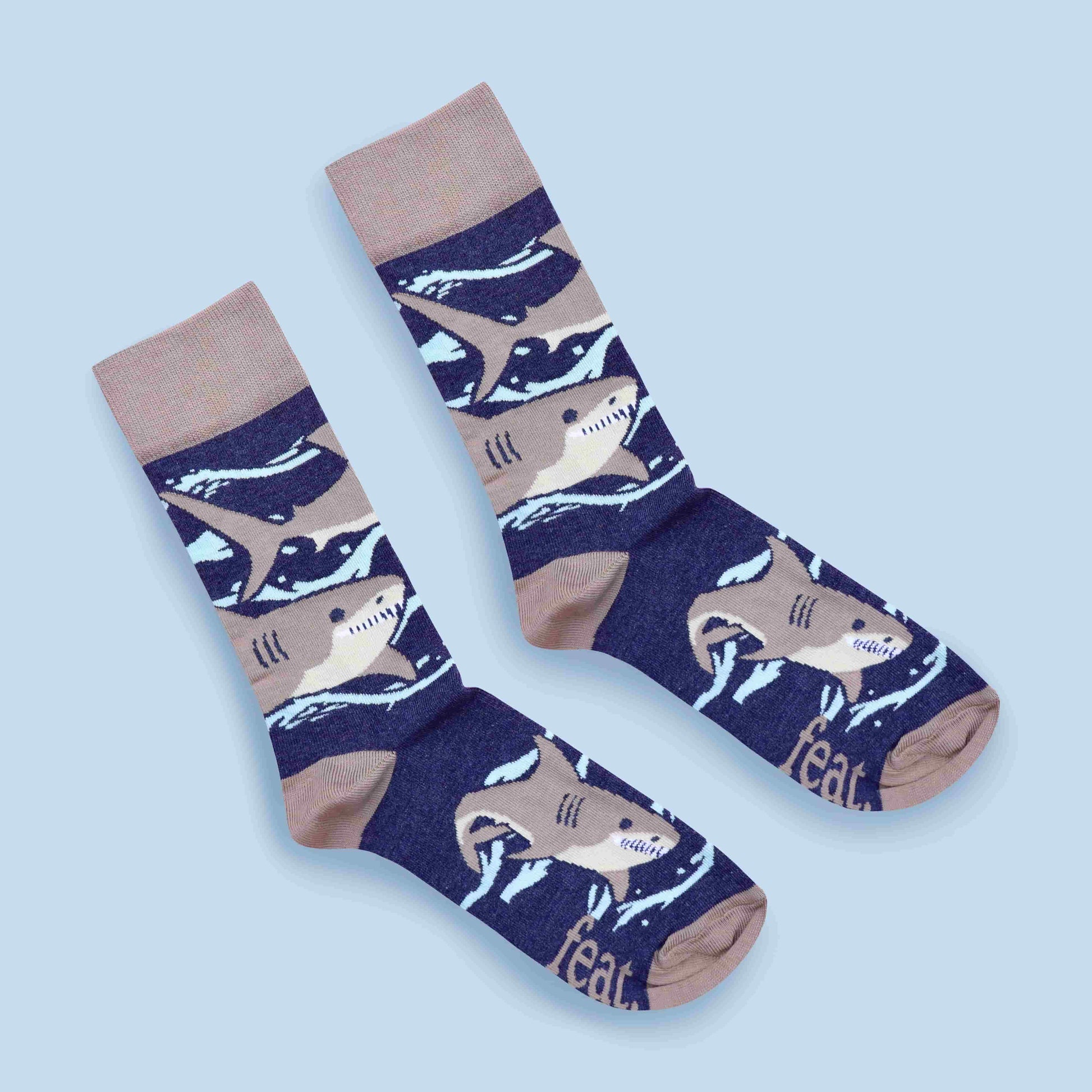 Grey shark socks blue background diagonal layout