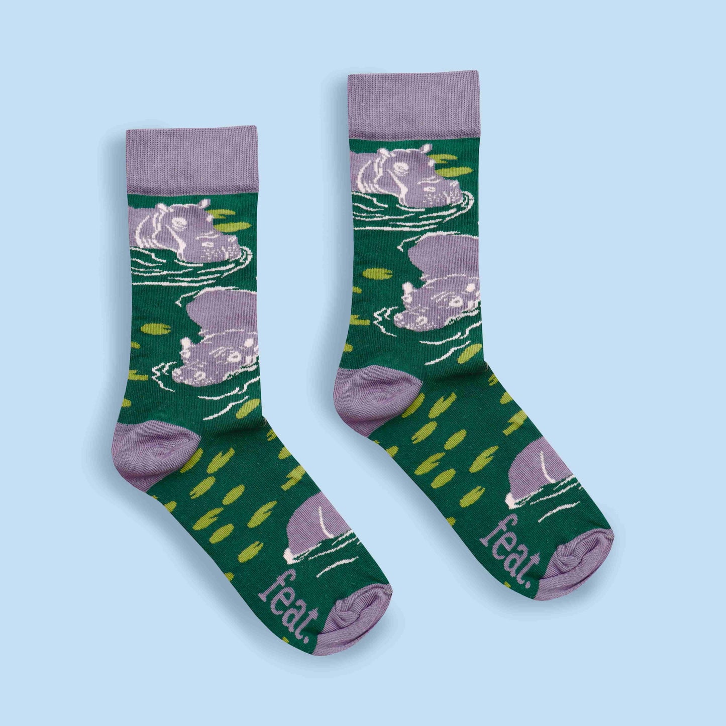 Hippo socks blue background centered layout