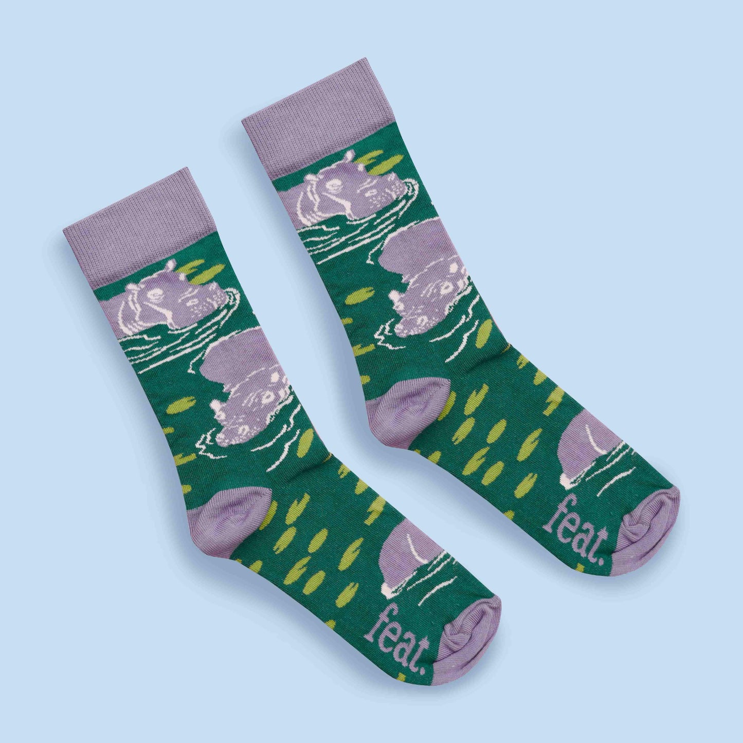 Hippo socks blue background diagonal layout