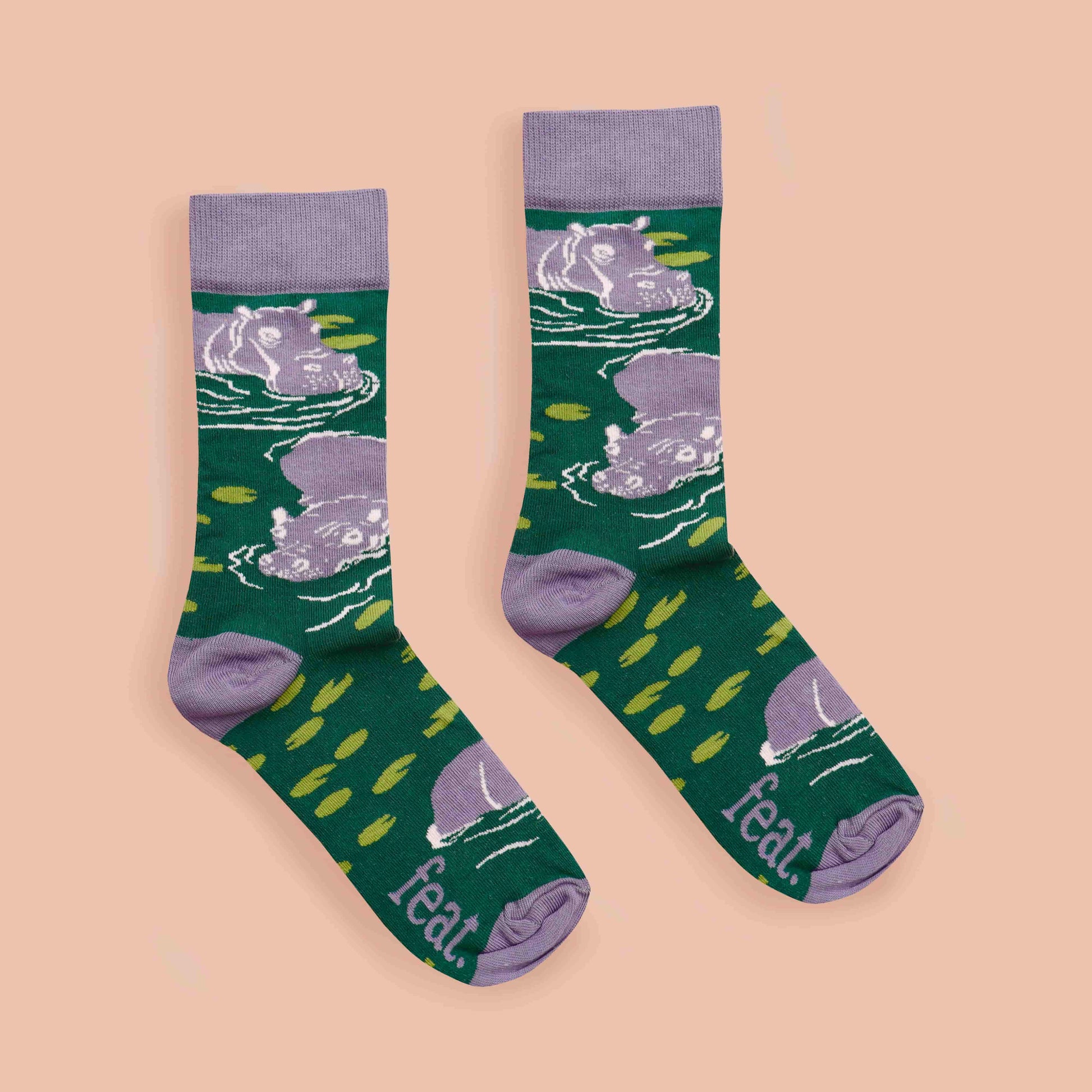 Hippo socks coral background centered layout