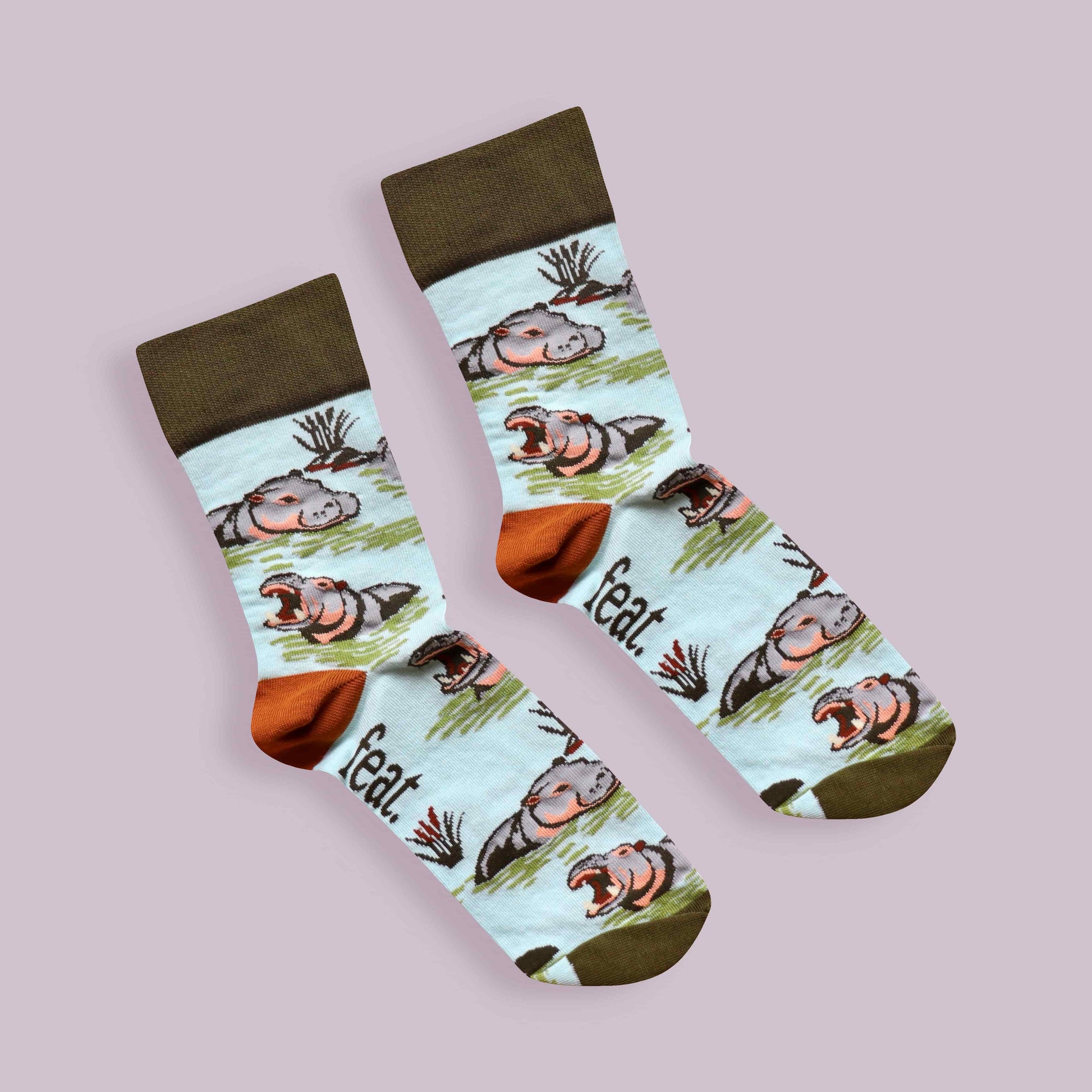 Hippo socks lilac background diagonal