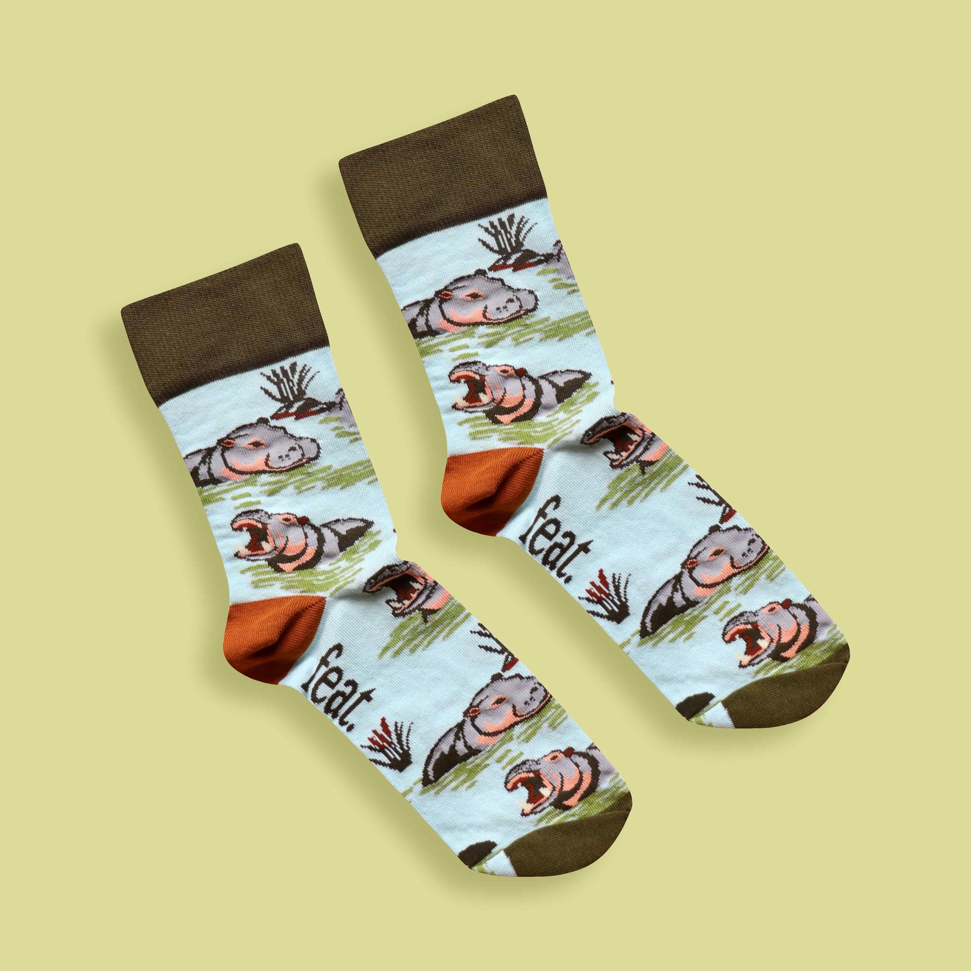 Hippo socks lime background diagonal