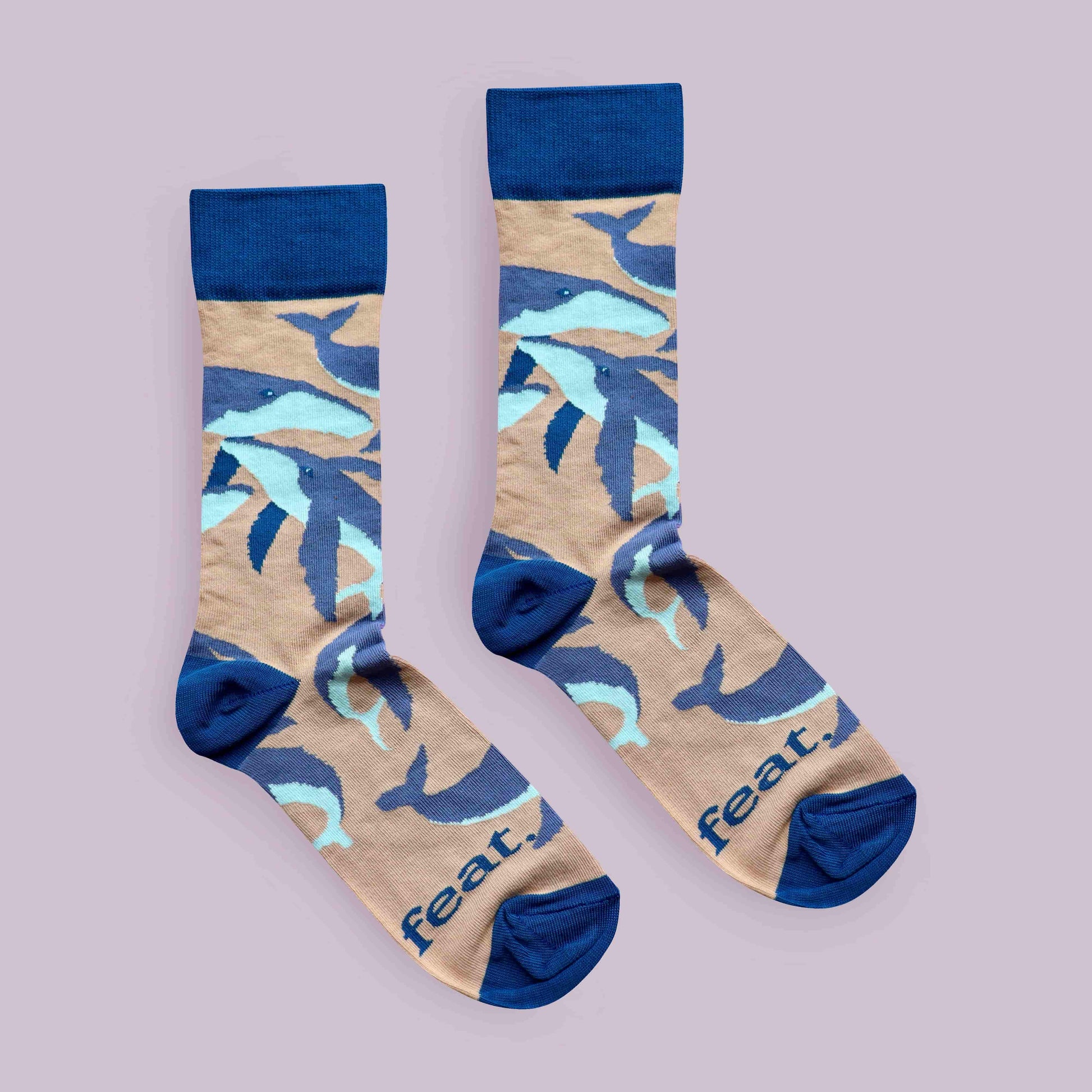 Humpback whale socks purple background centered