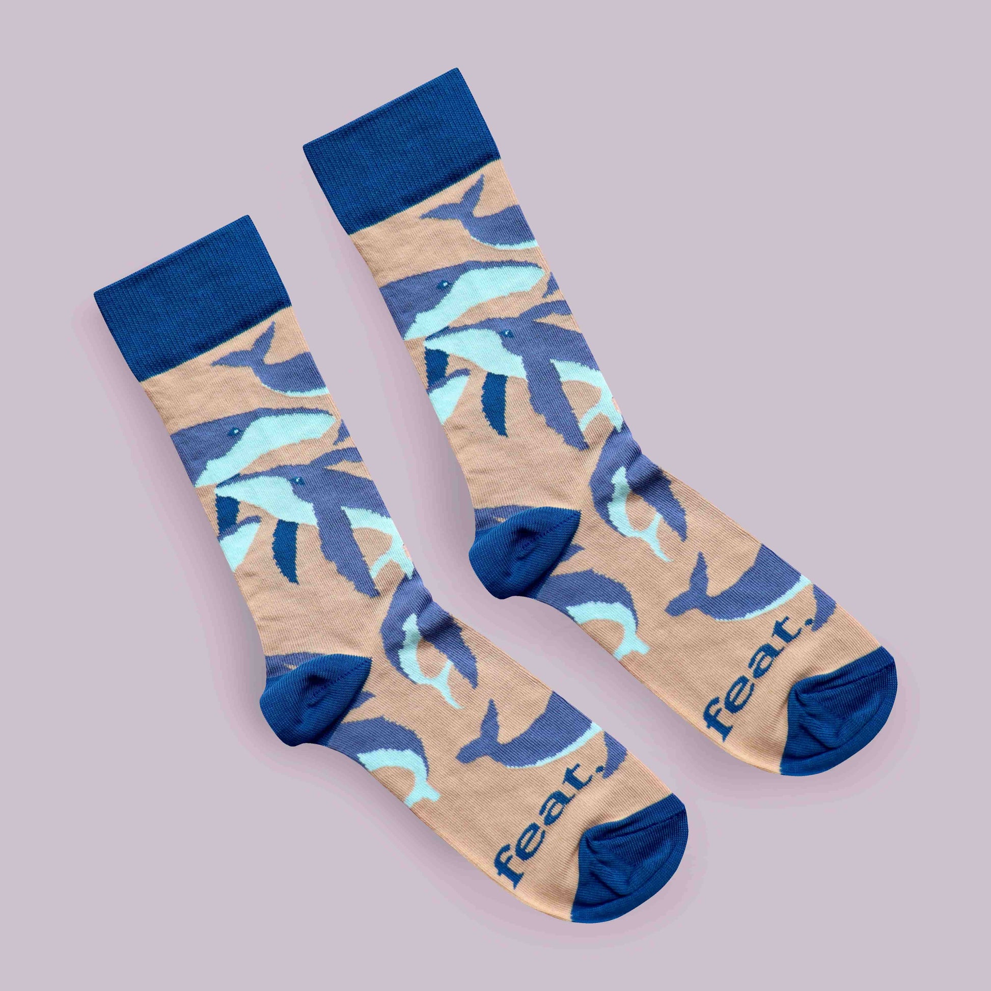 Humpback whale socks purple background diagonal