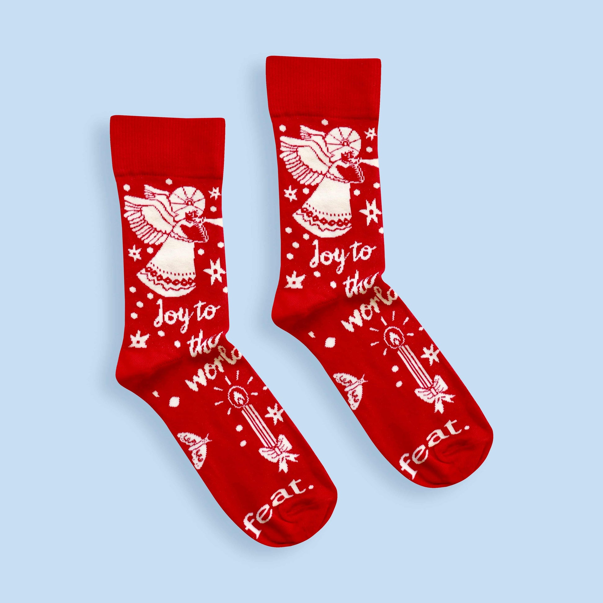 Joy to the world socks blue background centered