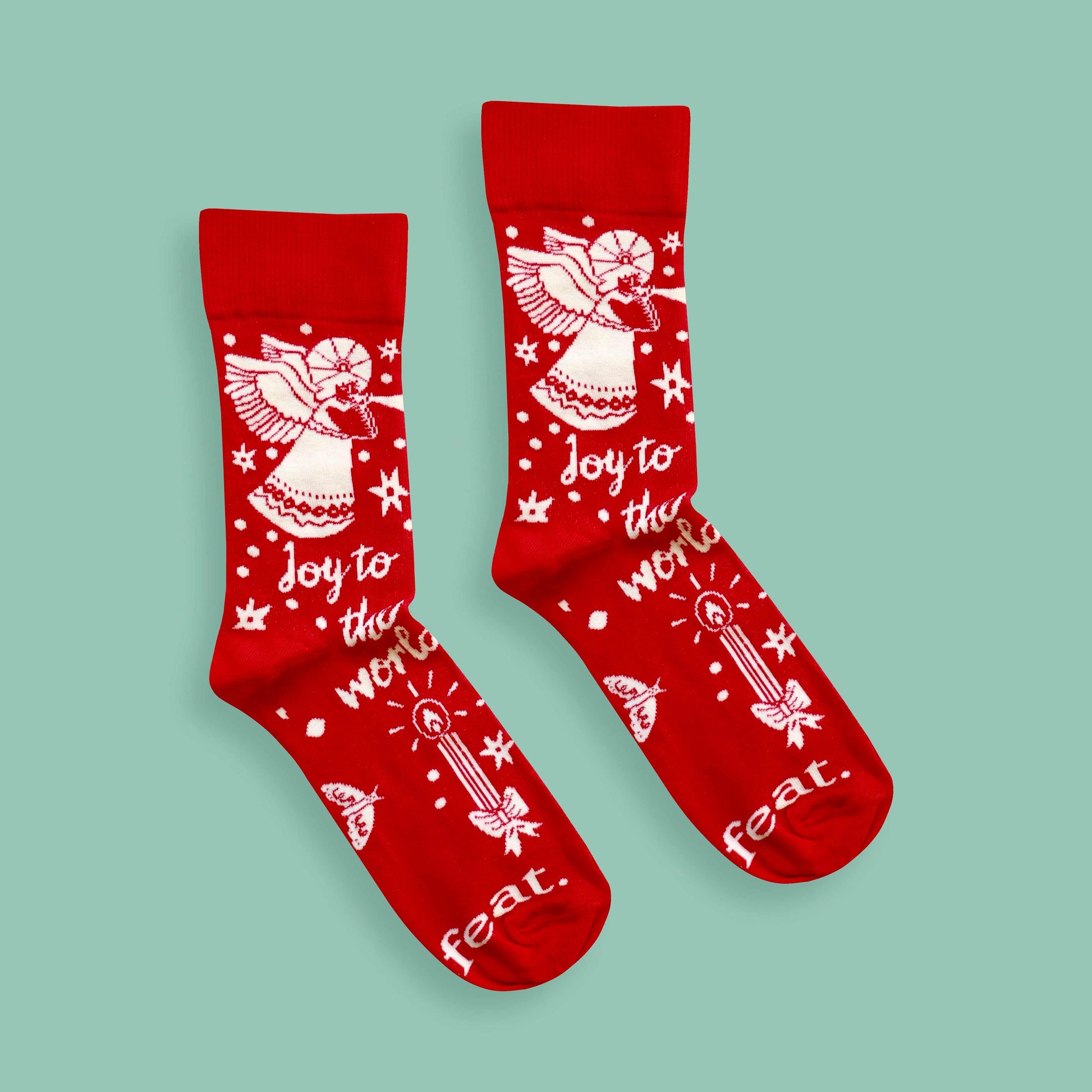 Joy to the world socks green background centered