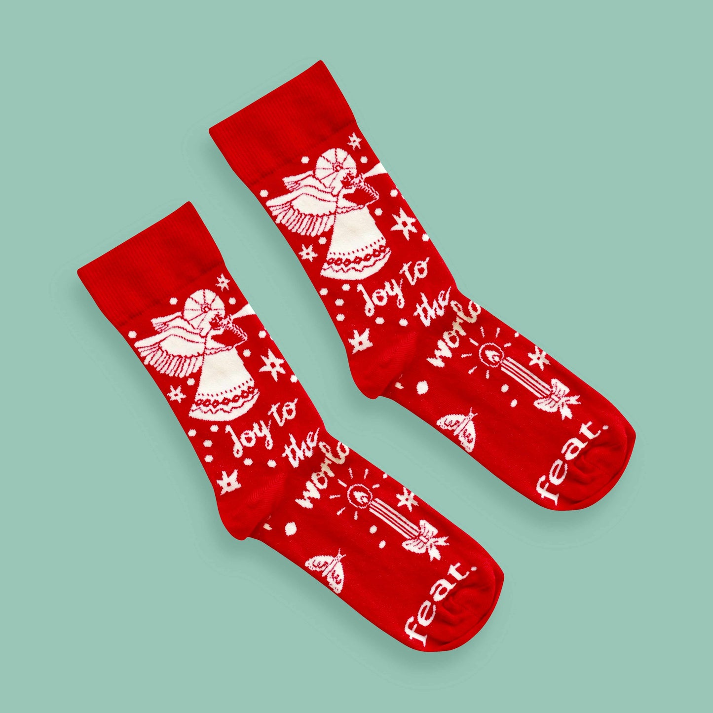 Joy to the world socks green background diagonal
