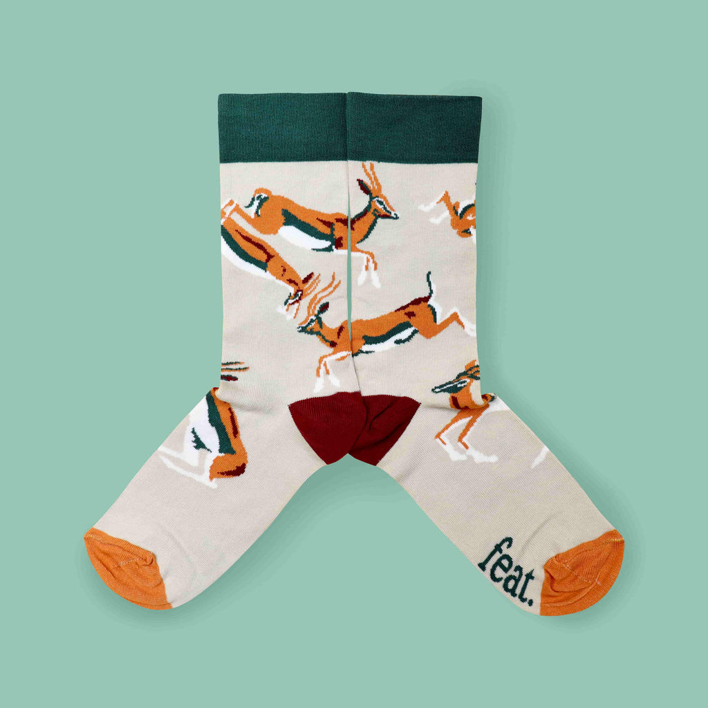 Khaki springbok socks green background middle