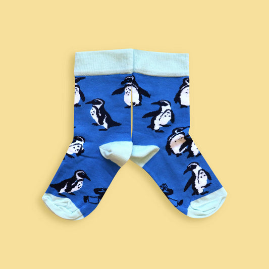Kids penguin socks yellow background mirrored