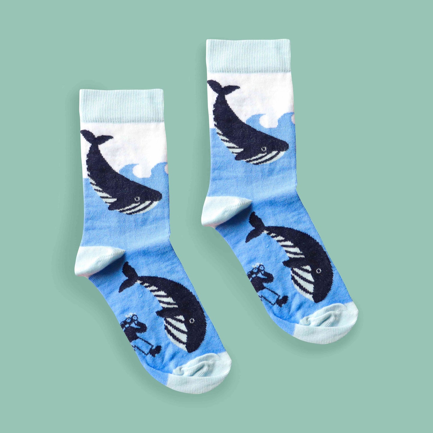 Kids whale socks green background centered