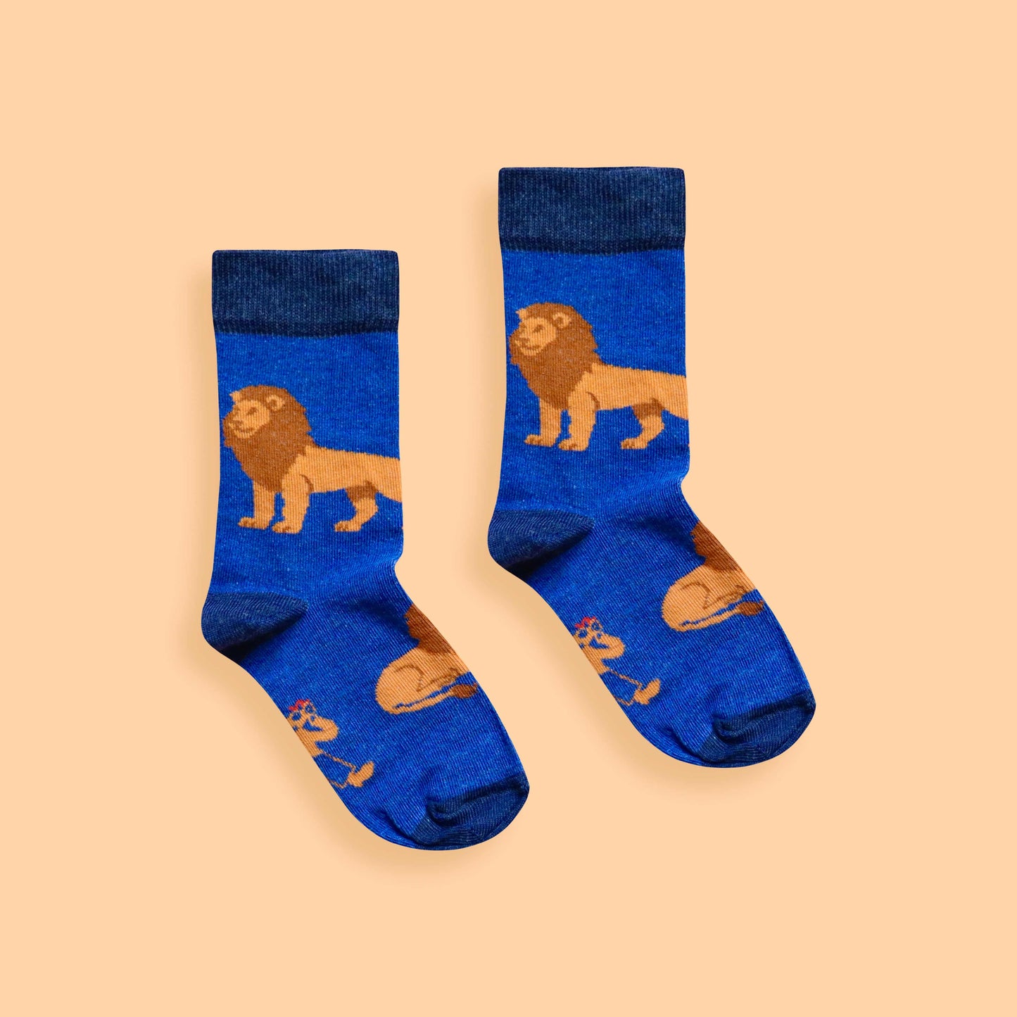 Kids Lion socks peach background centered