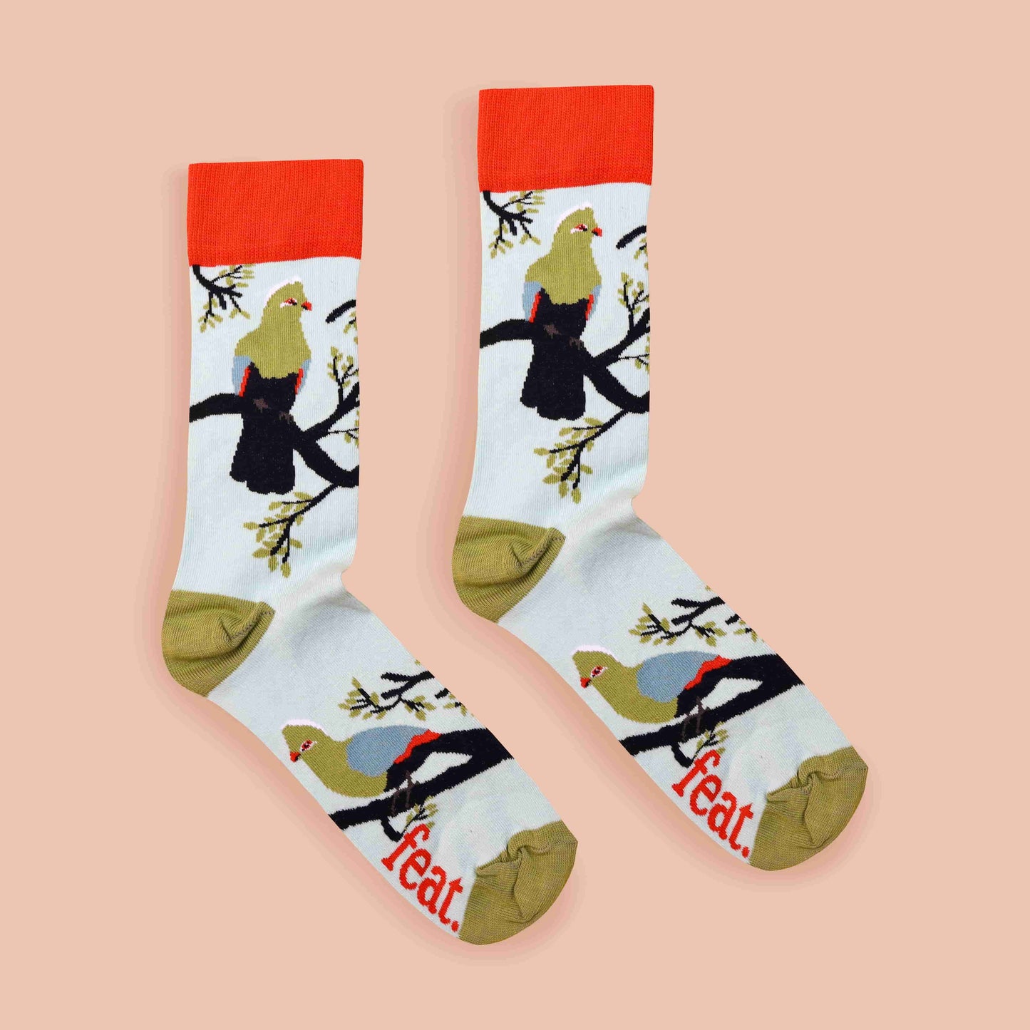 Ladies’ Knysna Loerie socks coral background centred