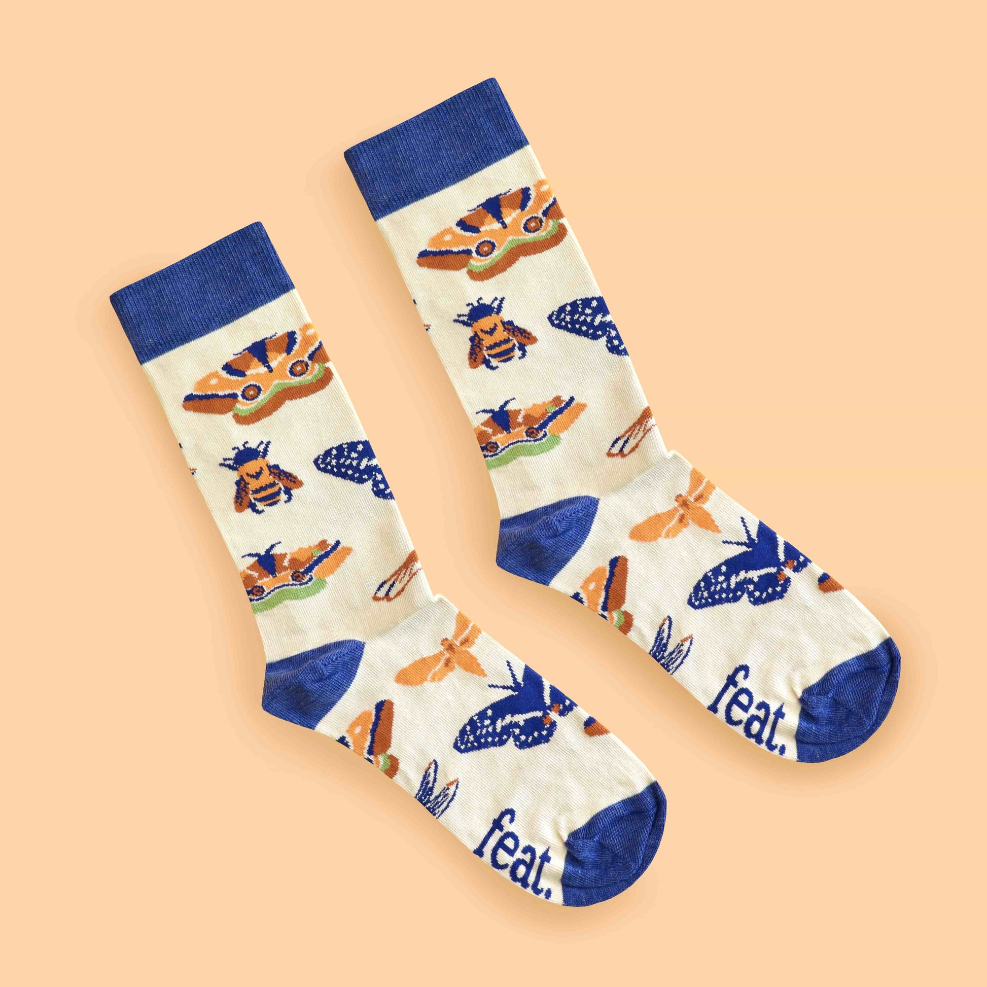 Ladies insect socks peach background diagonal