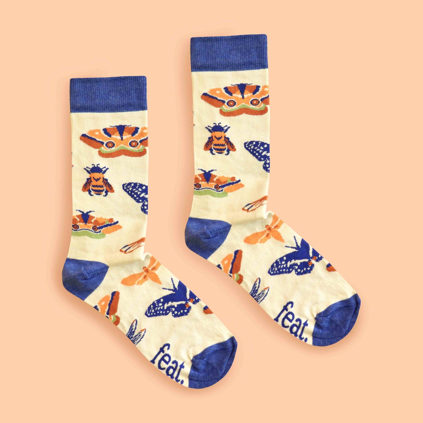 Ladies insect socks peach background centered