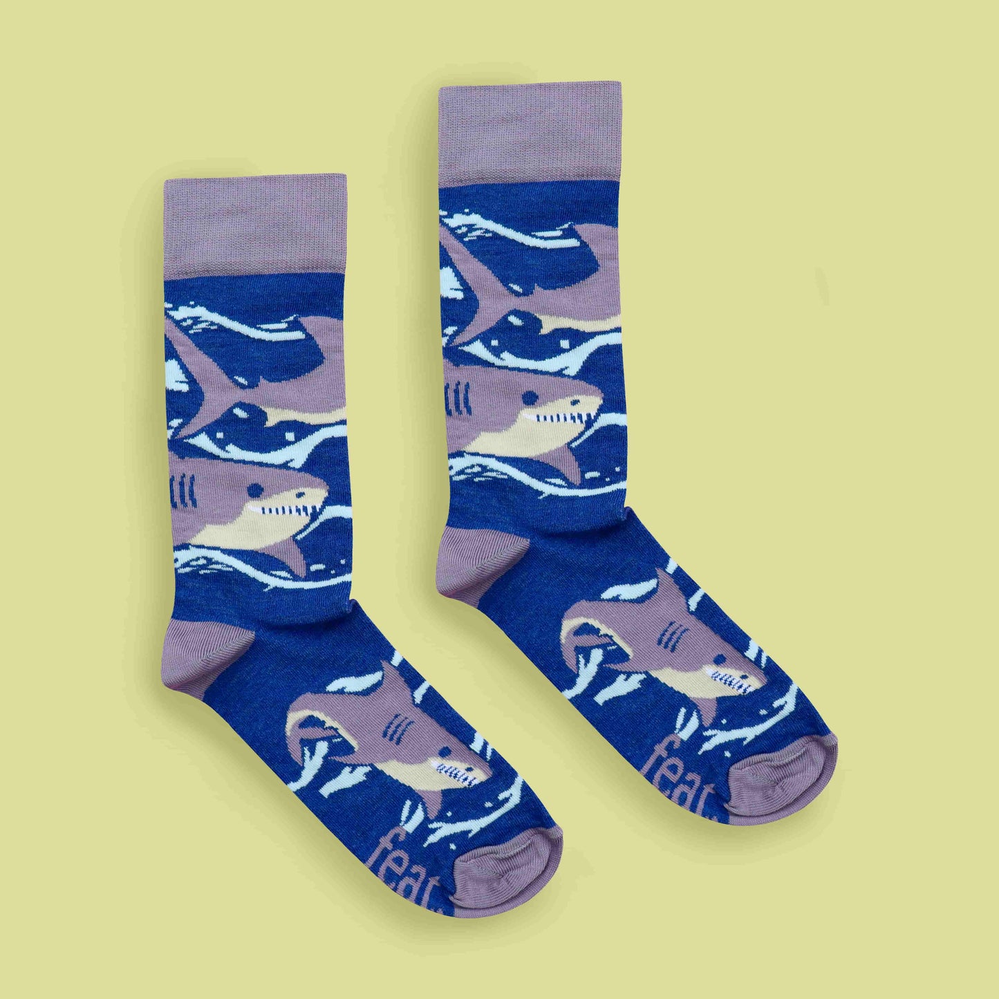 Purple shark socks lime background centered layout