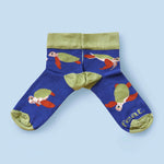 Loggerhead turtle socks with blue background centered layout