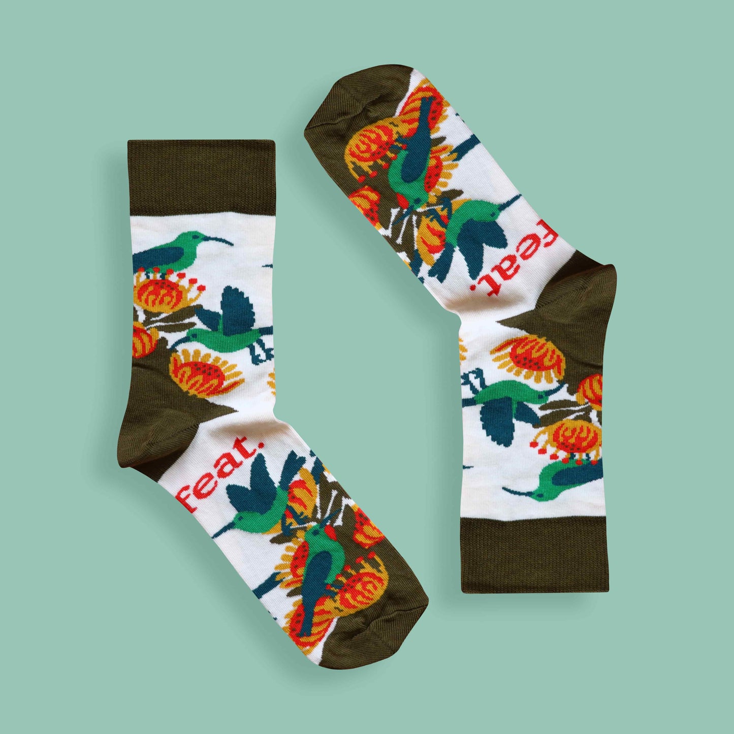 Ladies’ malachite sunbird socks green background inverted