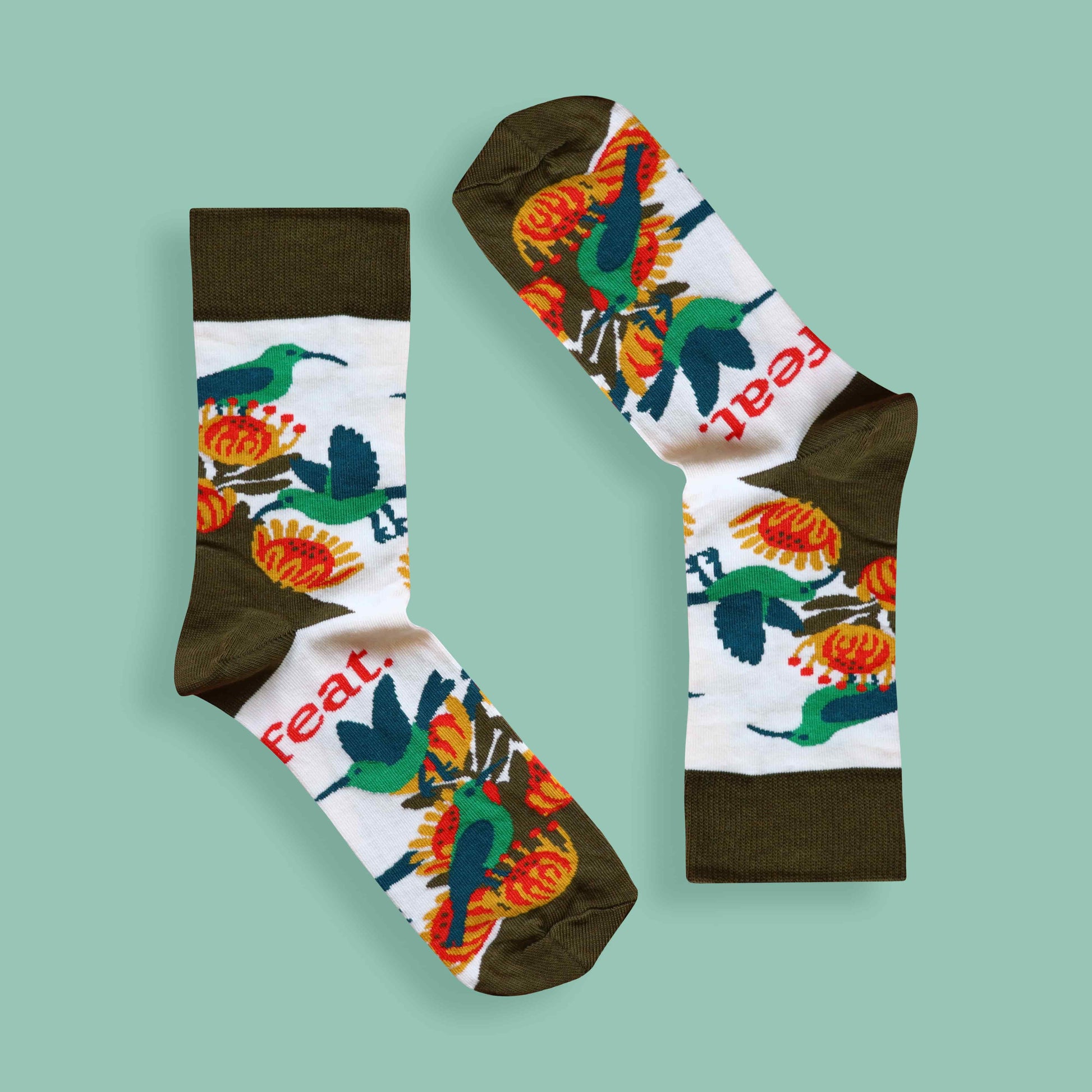 Ladies’ malachite sunbird socks green background inverted