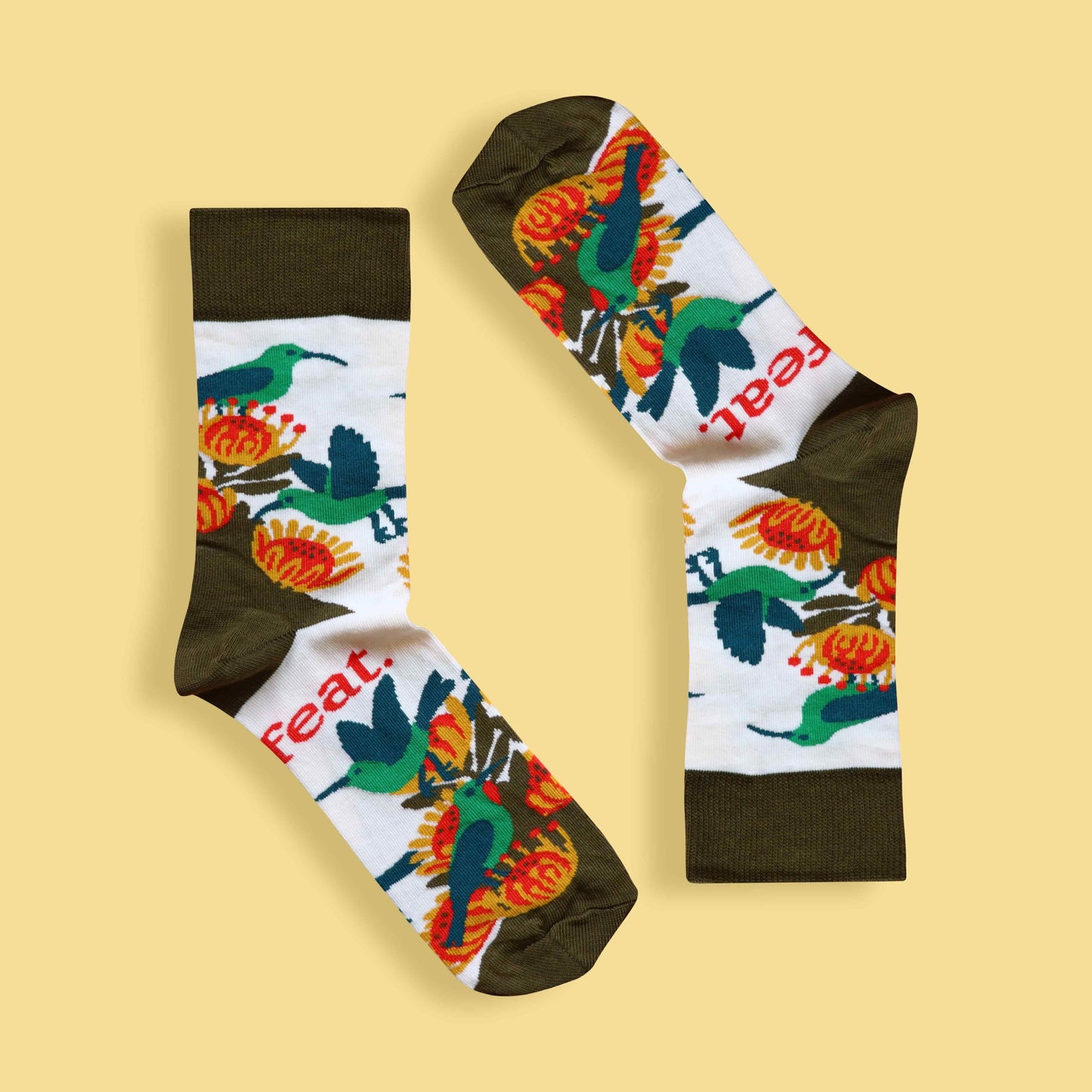Men’s malachite sunbird socks yellow background inverted
