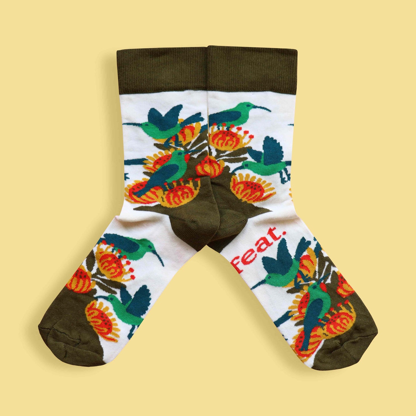 Men’s malachite sunbird socks yellow background mirrored