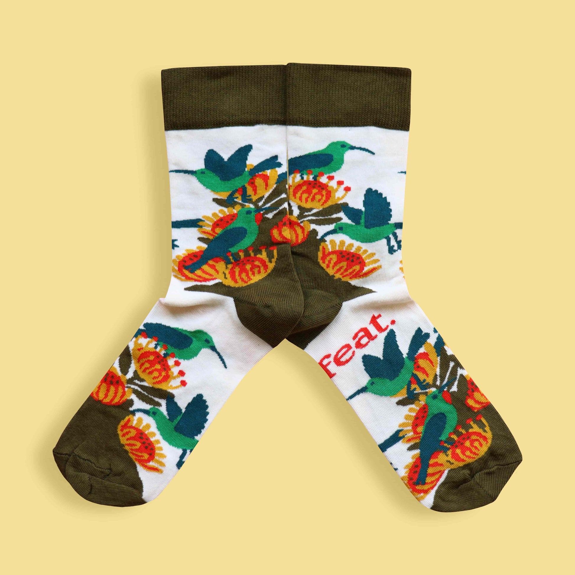 Men’s malachite sunbird socks yellow background mirrored