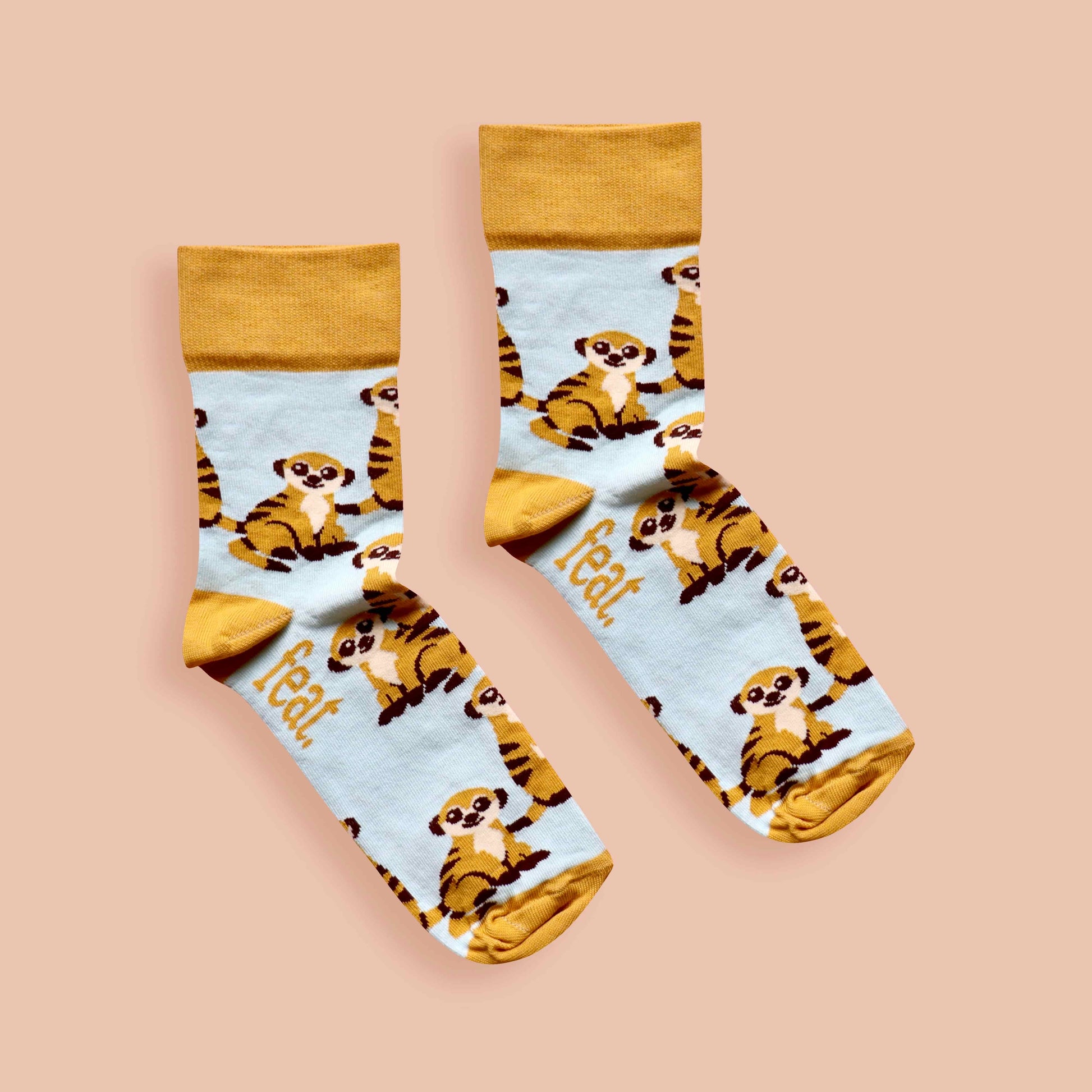 Meerkat socks pink background centered