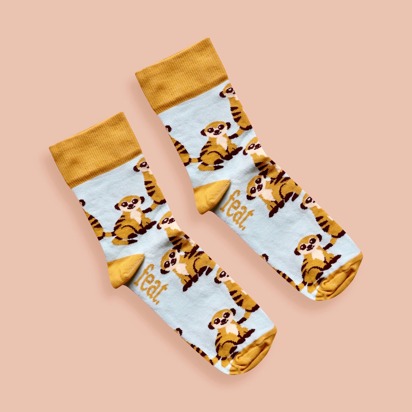Meerkat socks pink background diagonal
