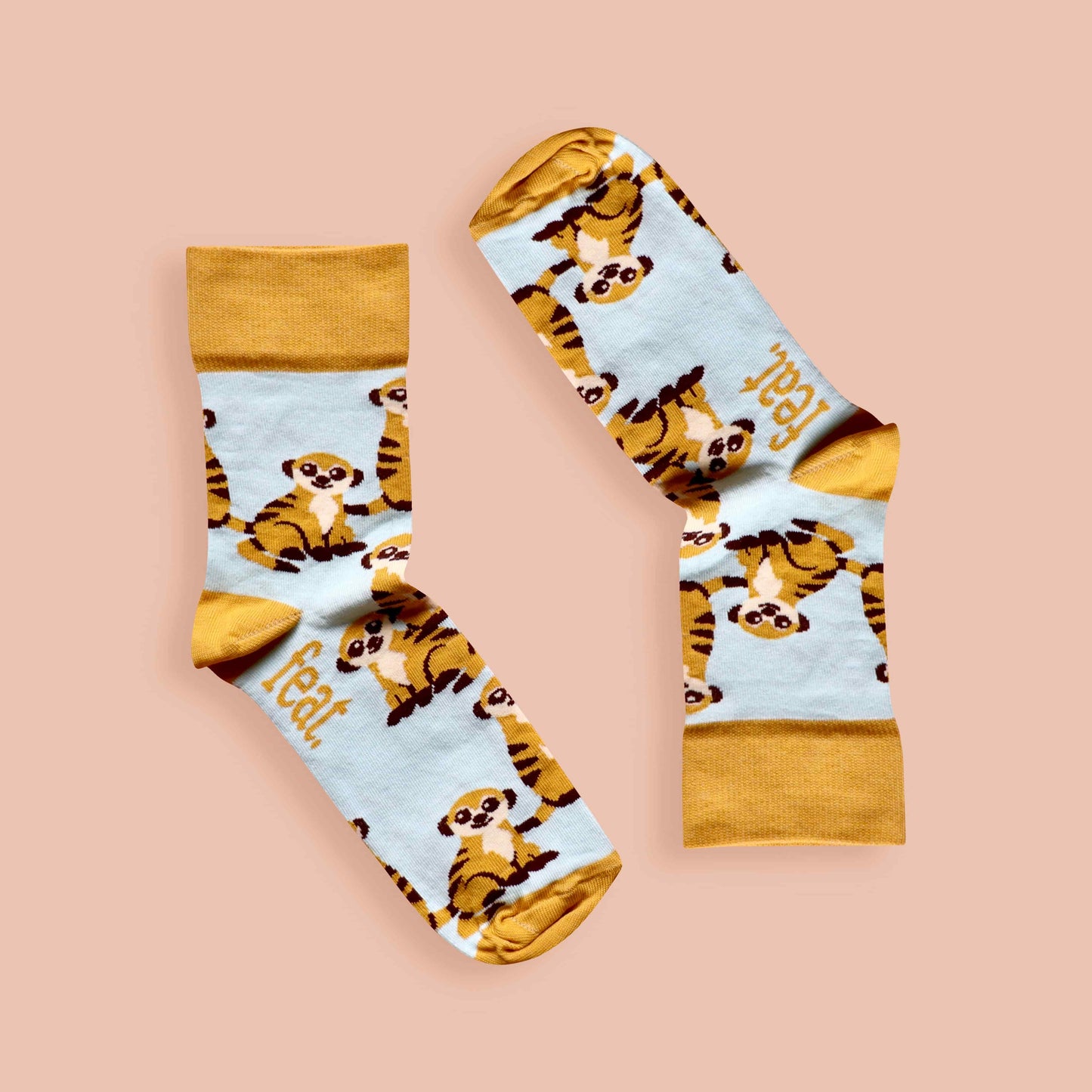 Meerkat socks pink background inverted