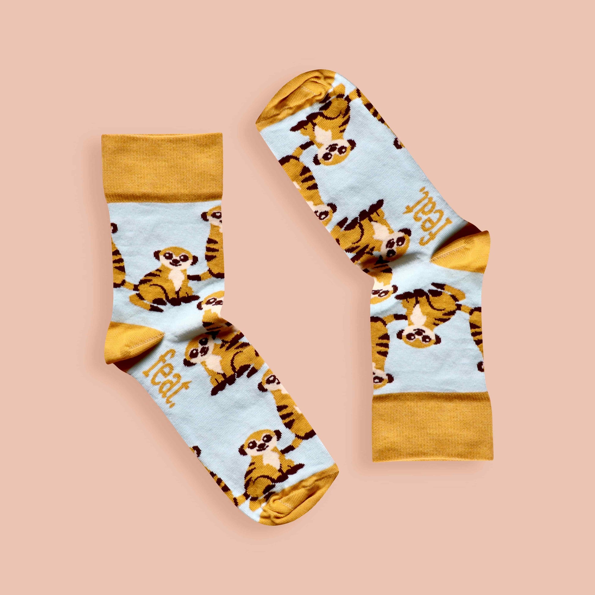 Meerkat socks pink background inverted