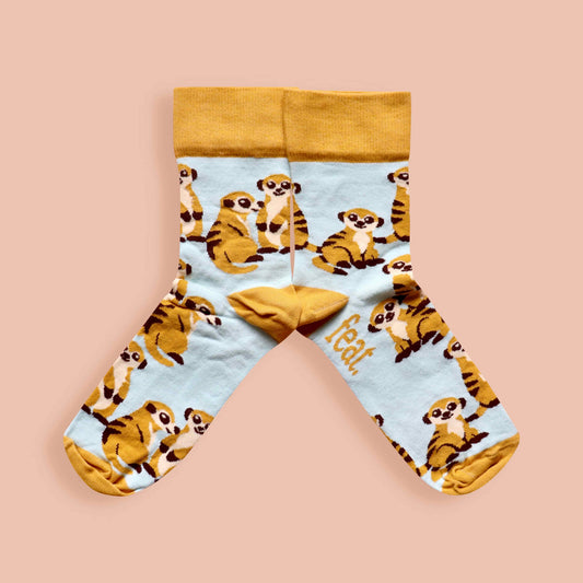 Meerkat socks pink background mirrored